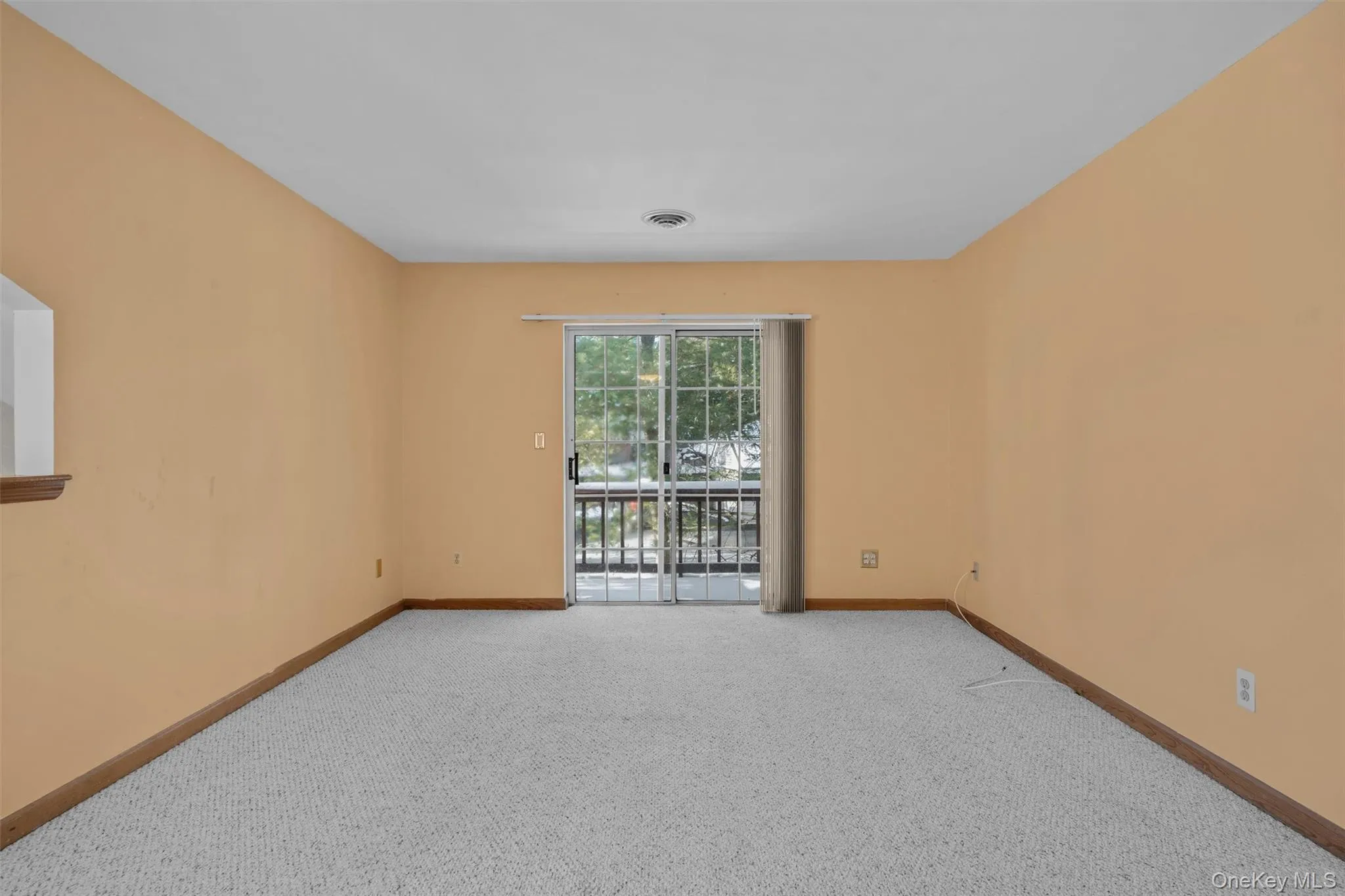 View of carpeted empty room View of carpeted empty room