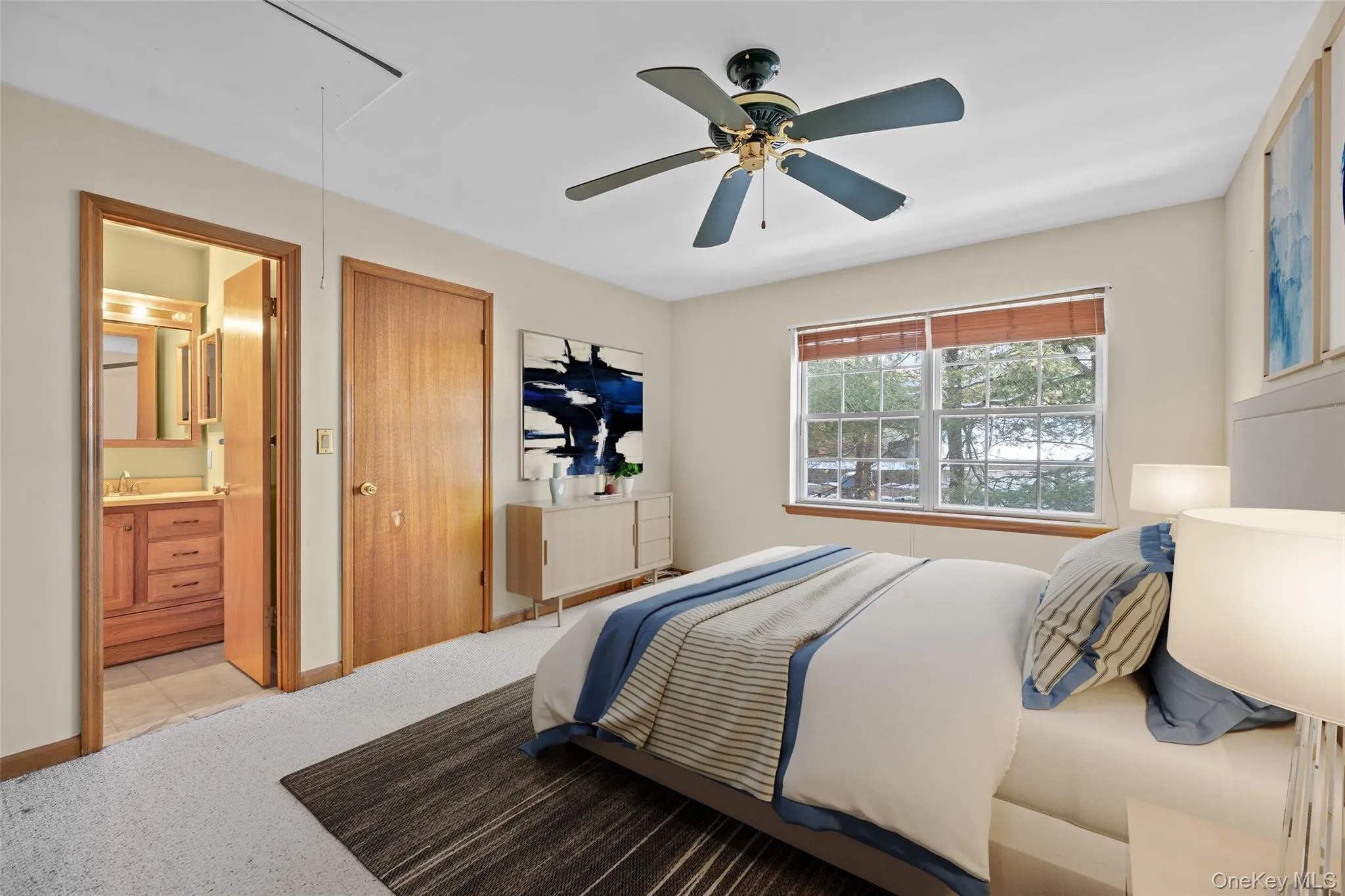 The bedroom offers a a primary bath. The bedroom offers a a primary bath.