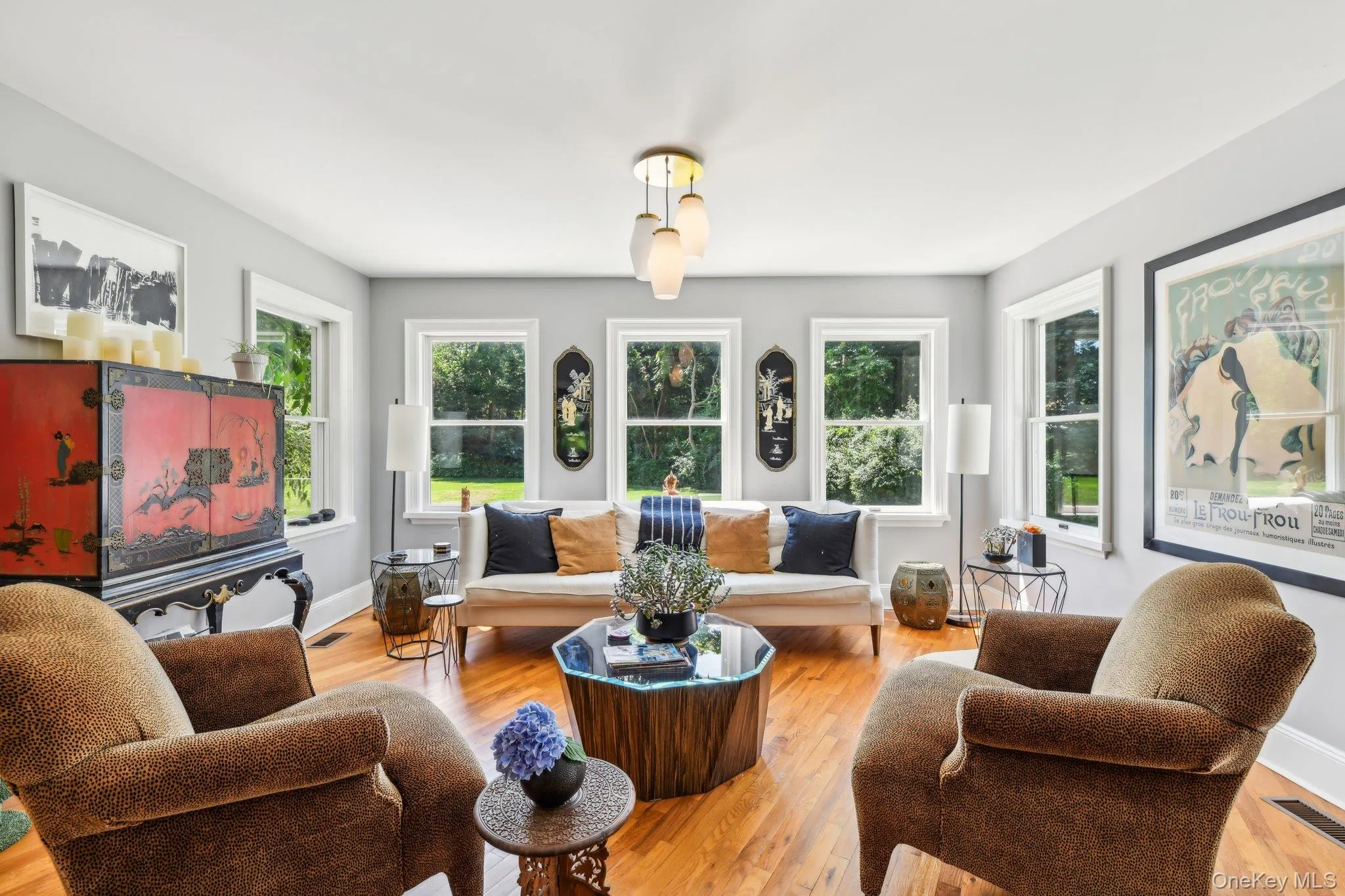 Living room with wood finished floors and baseboards Living room with wood finished floors and baseboards