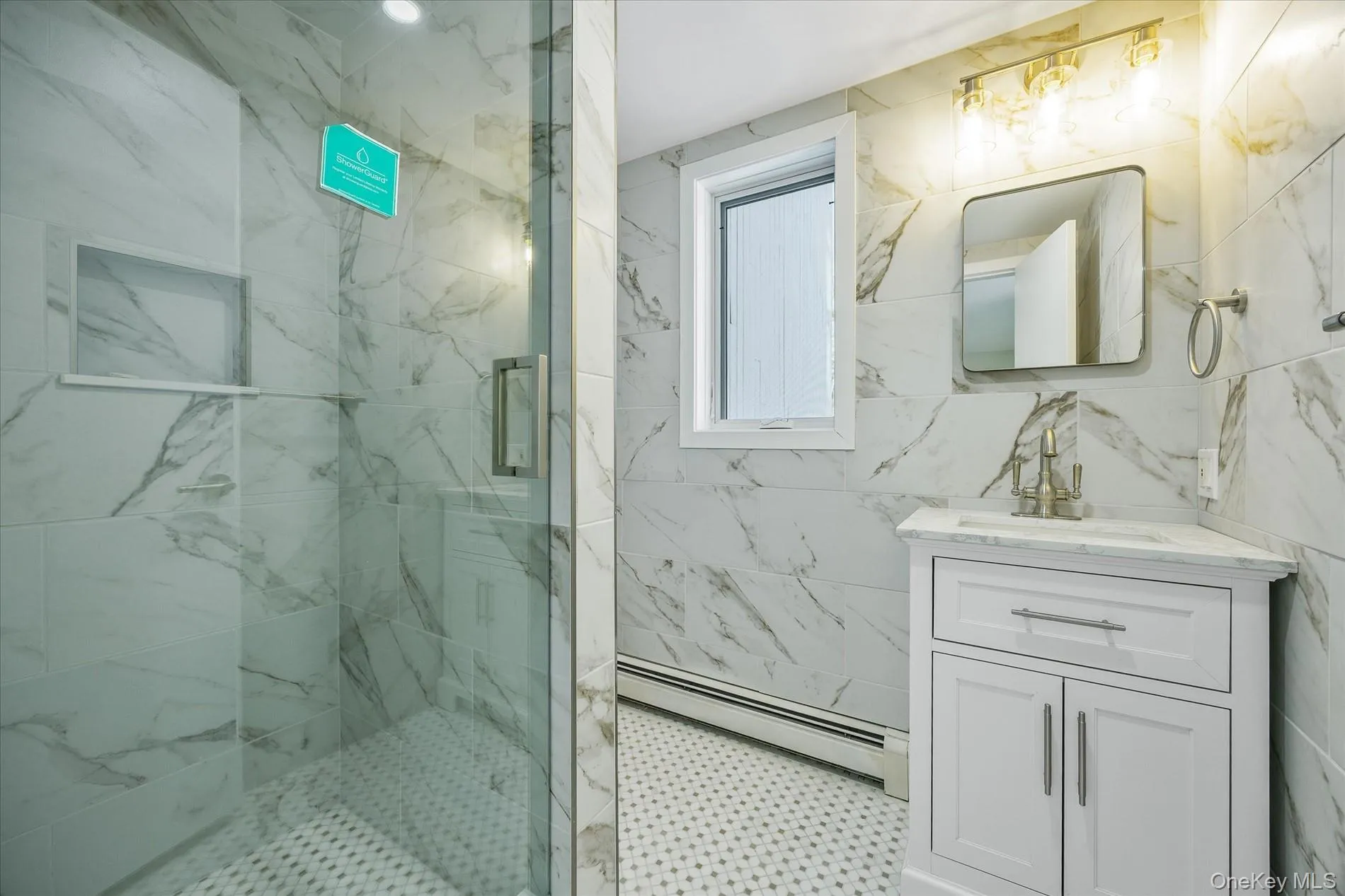 Full bath in basement. Full bath in basement.