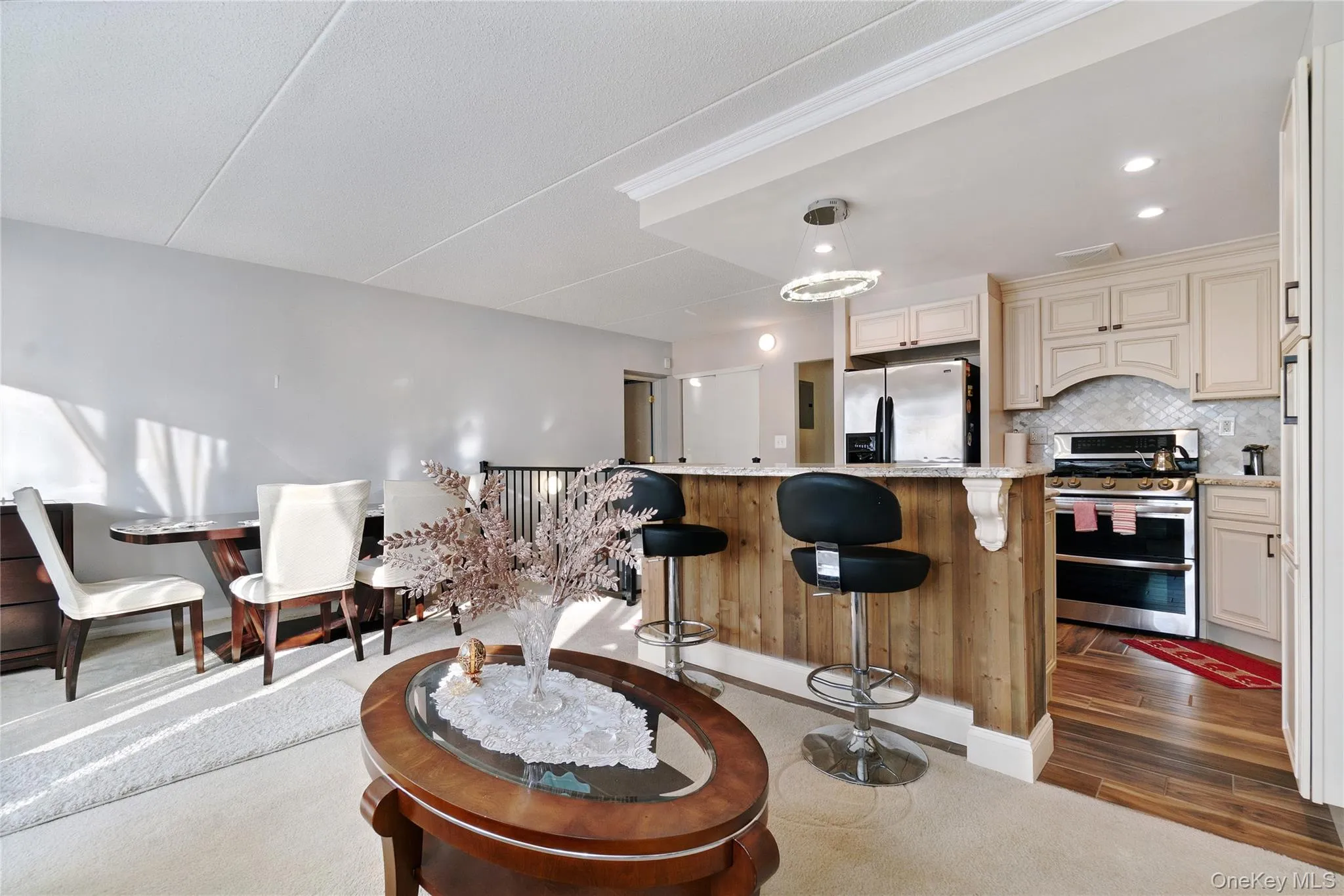 Open concept living room, dining room and sitting area Open concept living room, dining room and sitting area