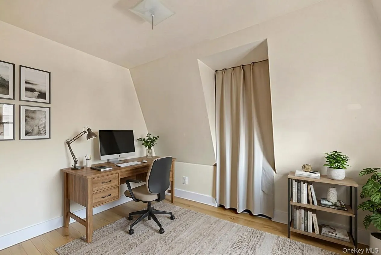 Bedroom #1 staged as an office. Bedroom #1 staged as an office.