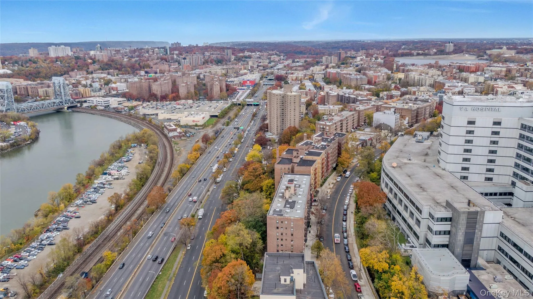 View of urban area with a large body of water View of urban area with a large body of water