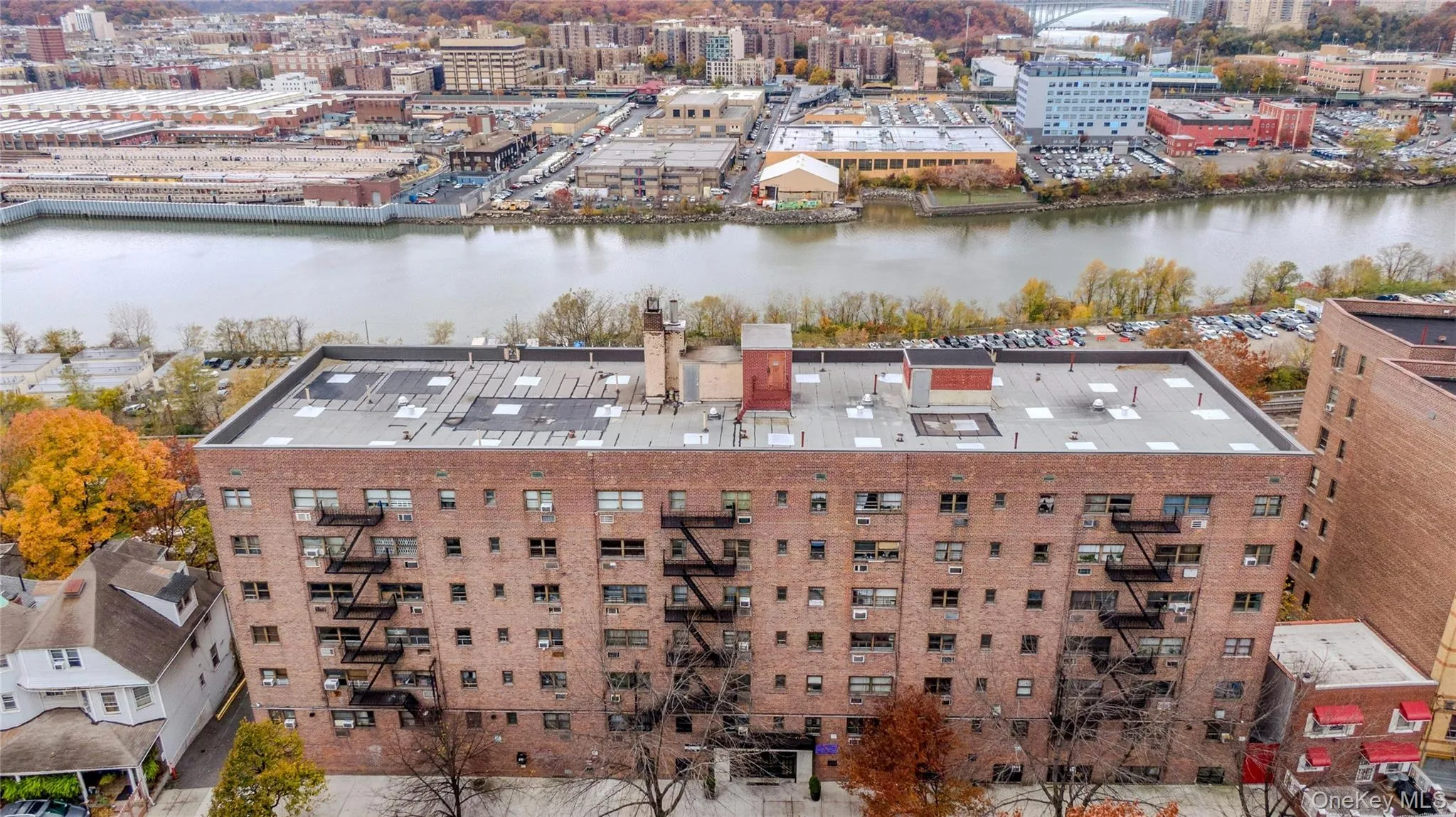 View of urban area featuring a large body of water View of urban area featuring a large body of water