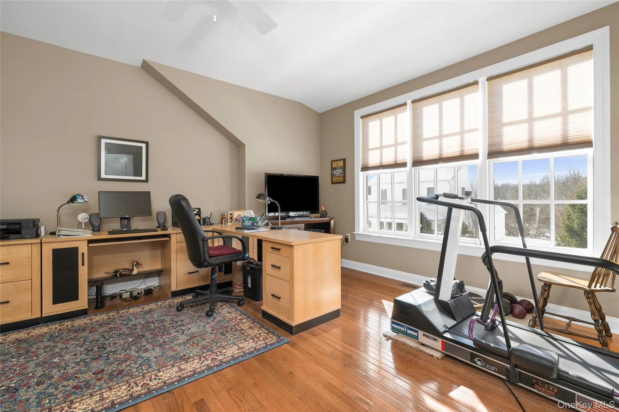 3rd Bedroom/Home office featuring light wood-style flooring and a ceiling fan. 3rd Bedroom/Home office featuring light wood-style flooring and a ceiling fan.