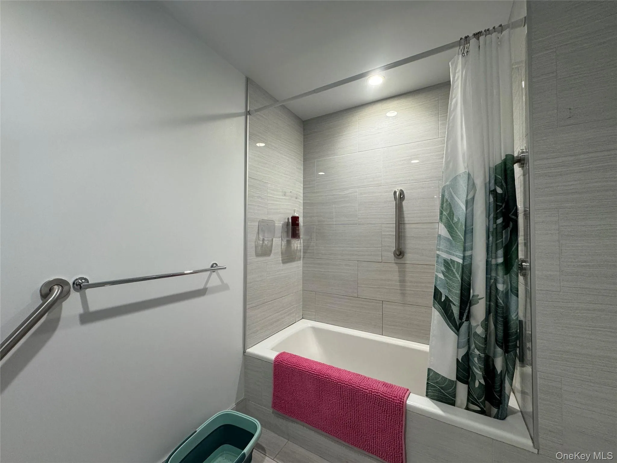 Full bathroom with shower / bath combo with shower curtain Full bathroom with shower / bath combo with shower curtain