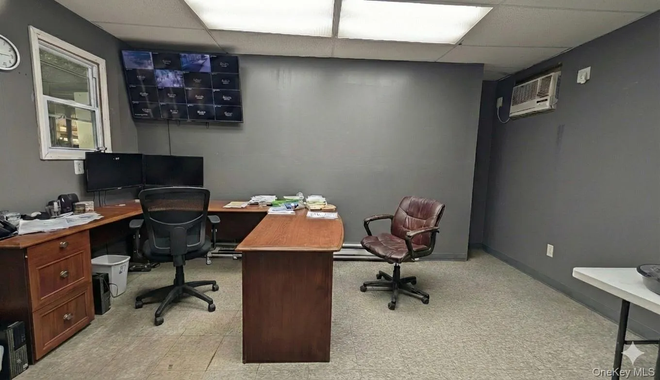 Office space featuring adropceiling Office space featuring adropceiling