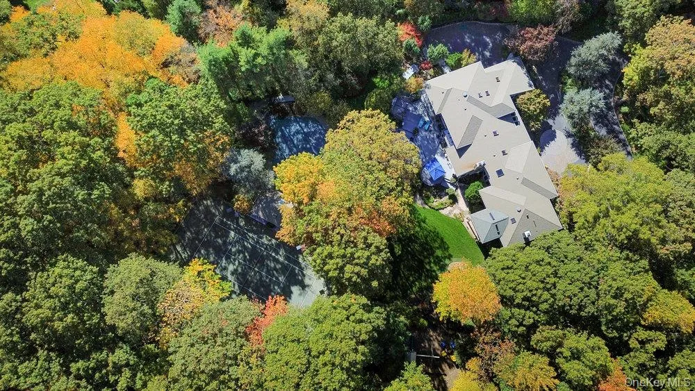 View of property which showcases the size and privacy of the home. View of property which showcases the size and privacy of the home.