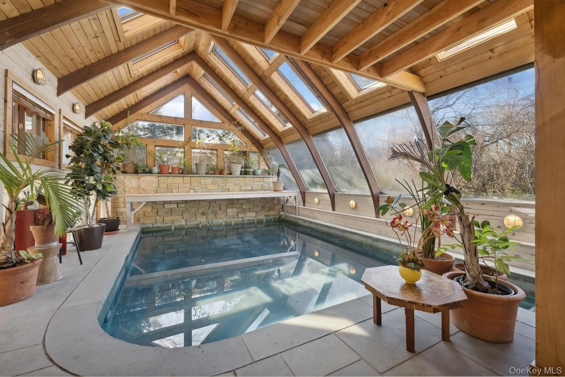 View of swimming pool with a skylight View of swimming pool with a skylight