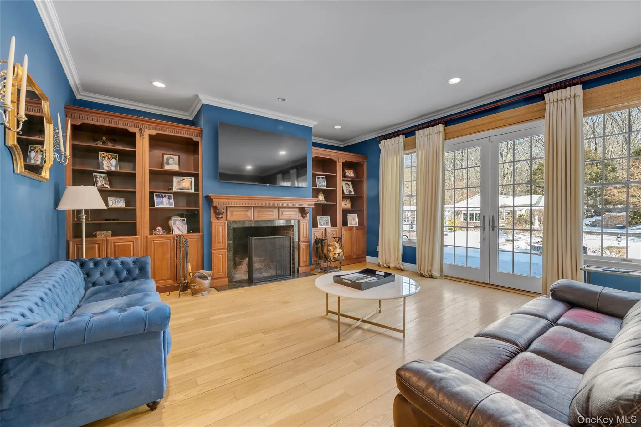 Richly appointed den with fireplace Richly appointed den with fireplace