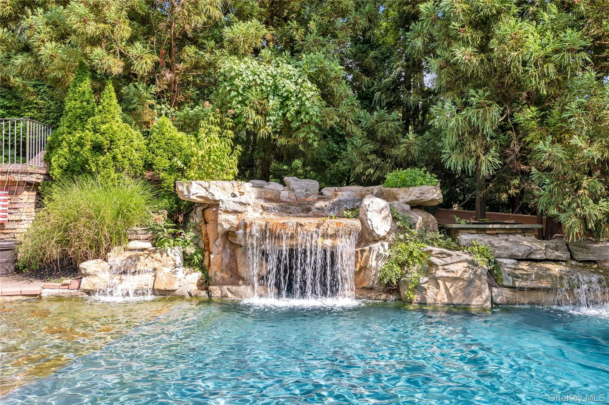 Stunning waterfall to pool Stunning waterfall to pool
