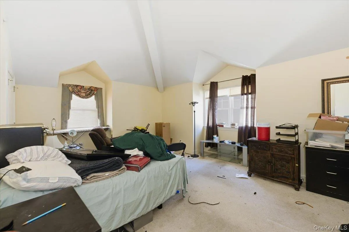 Upstairs spare bedroom with vaulted ceiling Upstairs spare bedroom with vaulted ceiling