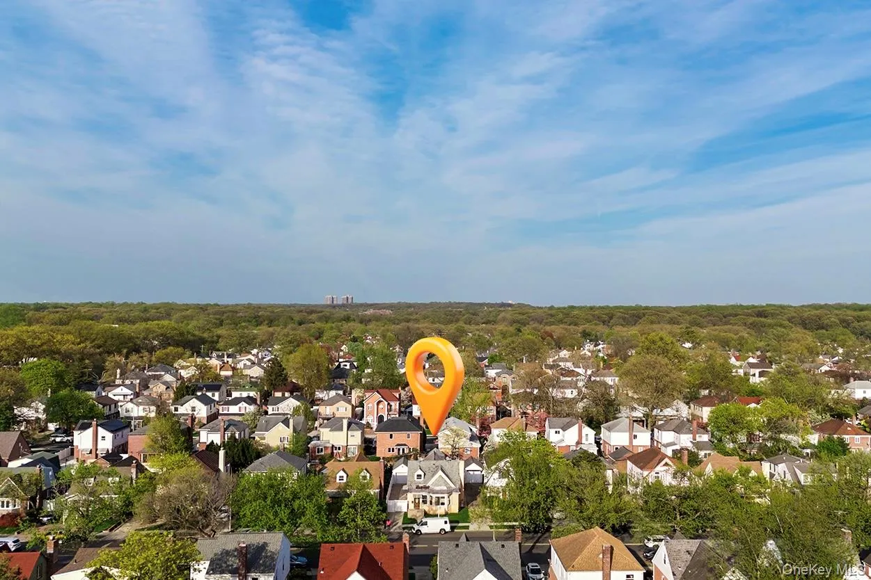 Drone / aerial view with a forest view and a residential view Drone / aerial view with a forest view and a residential view