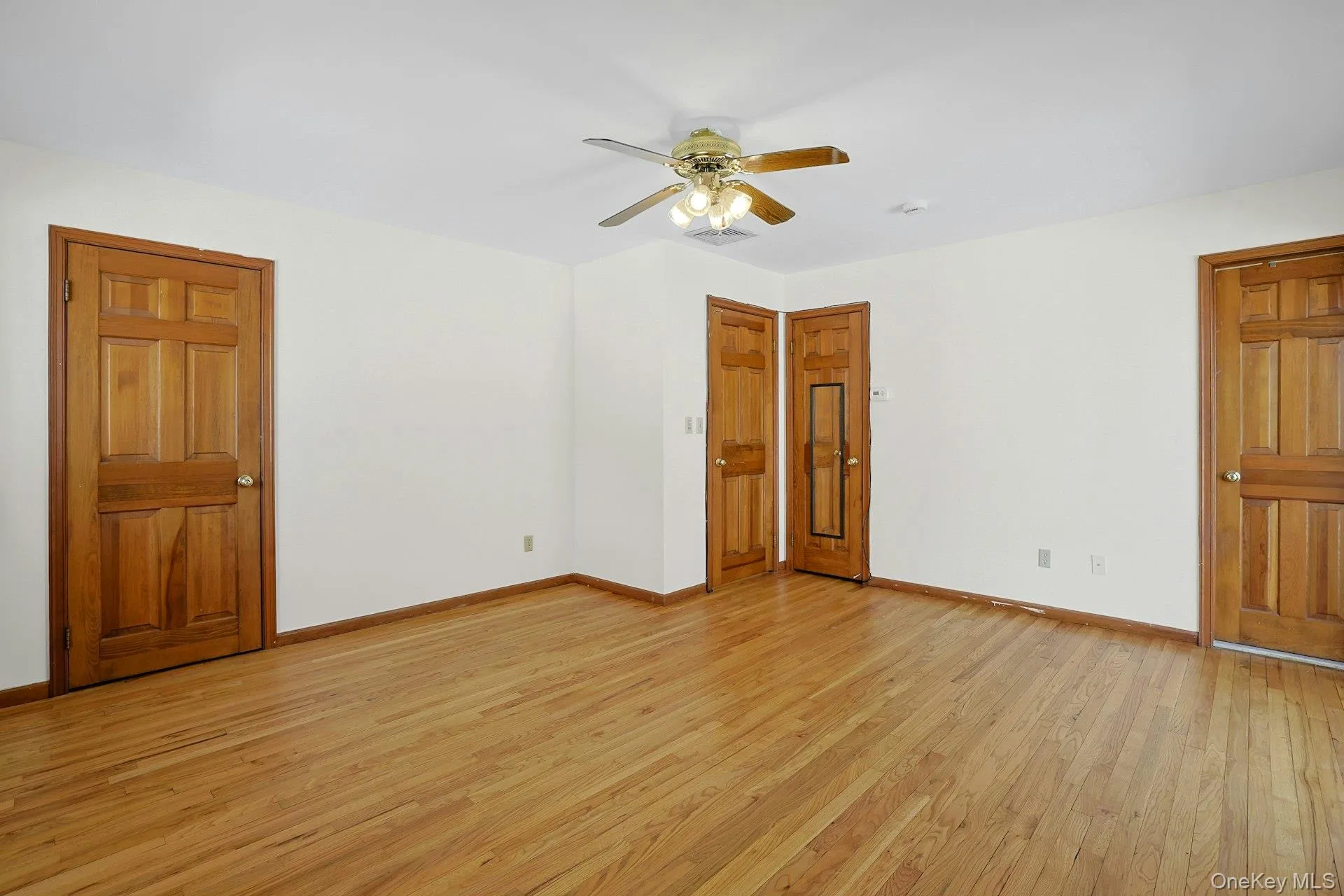 There is ample closet space here in the primary bedroom. On the right, the door to the en-suite bath. There is ample closet space here in the primary bedroom. On the right, the door to the en-suite bath.
