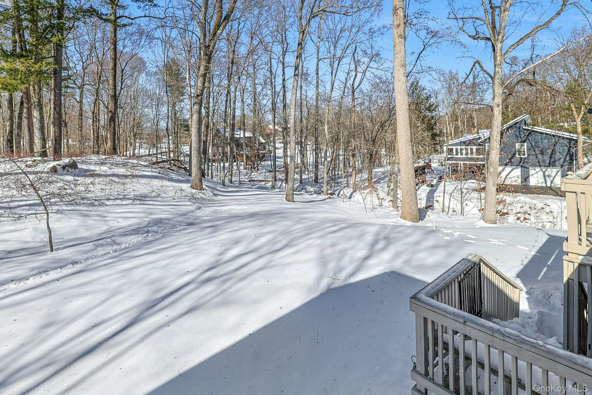The rear yard has a large open space, perfect for tossing around a ball or a little light gardening. The rear yard has a large open space, perfect for tossing around a ball or a little light gardening.