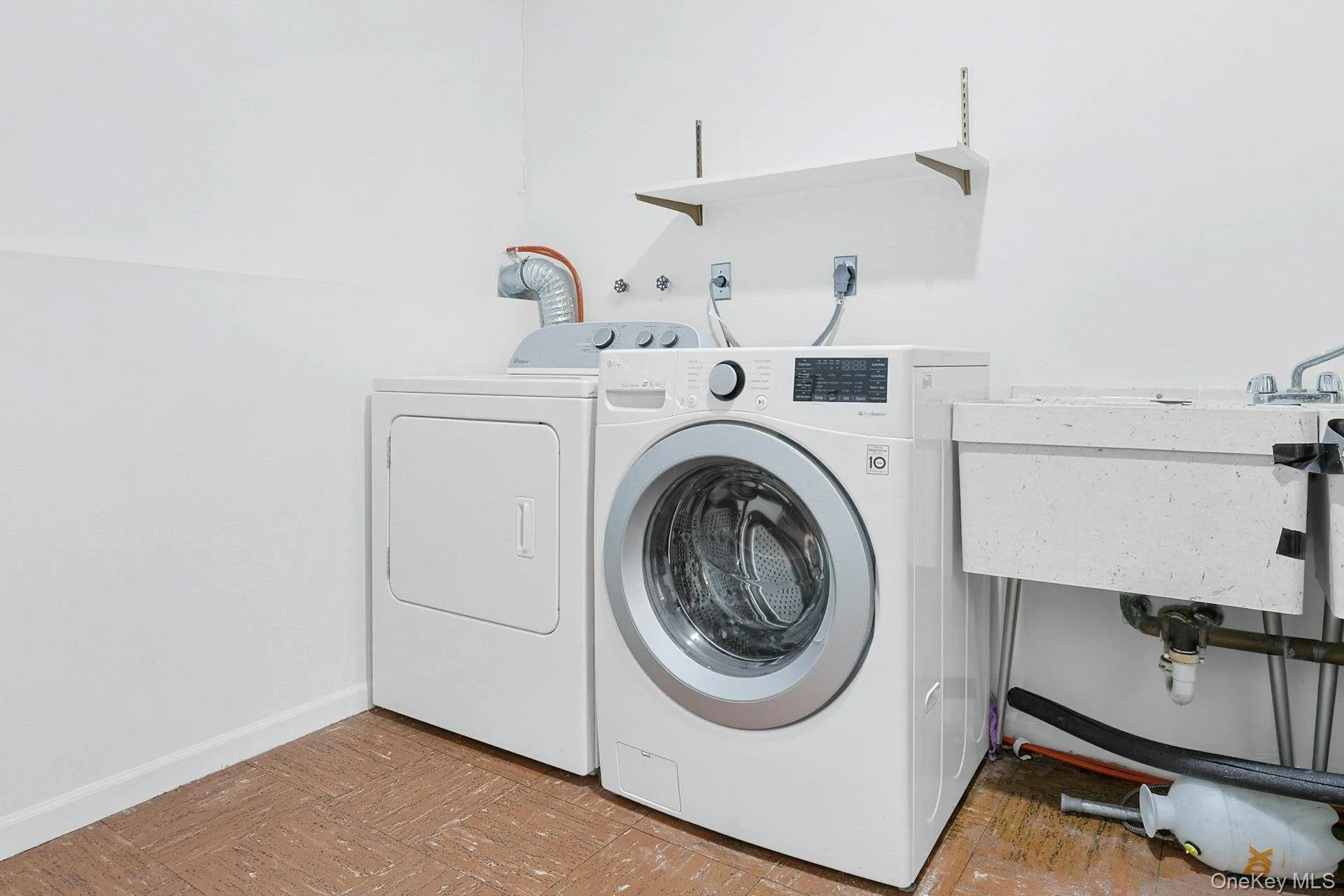 The laundry and utility room has a washer, dryer and convenient sink. No need to bother with any laundromats! The laundry and utility room has a washer, dryer and convenient sink. No need to bother with any laundromats!