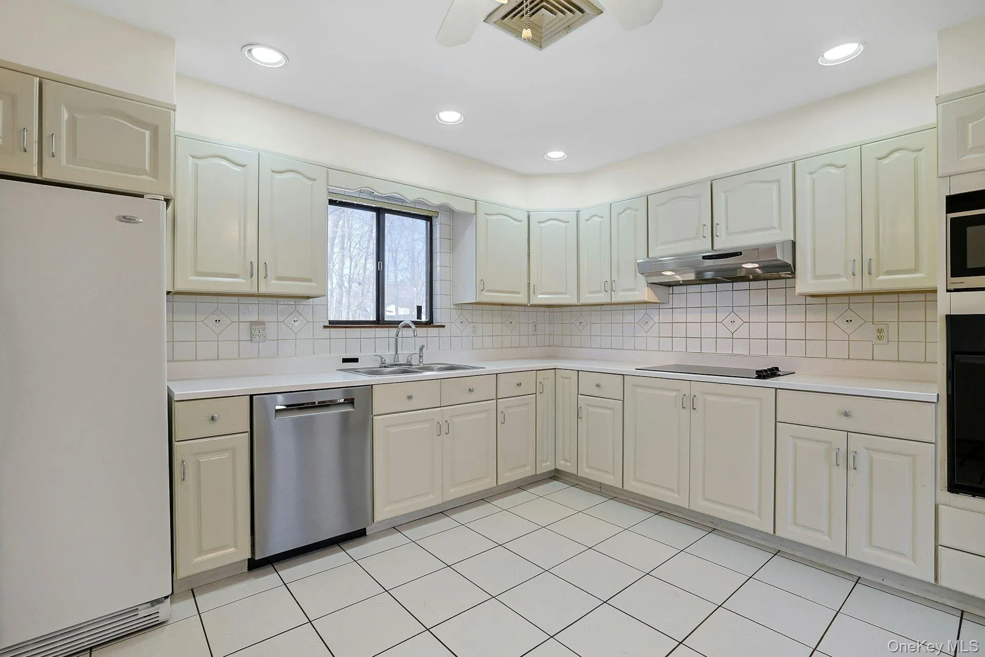With tile floor, abundant overhead light, ample cabinets and an eat-in area, the kitchen is a great spot to prepare a meal. With tile floor, abundant overhead light, ample cabinets and an eat-in area, the kitchen is a great spot to prepare a meal.