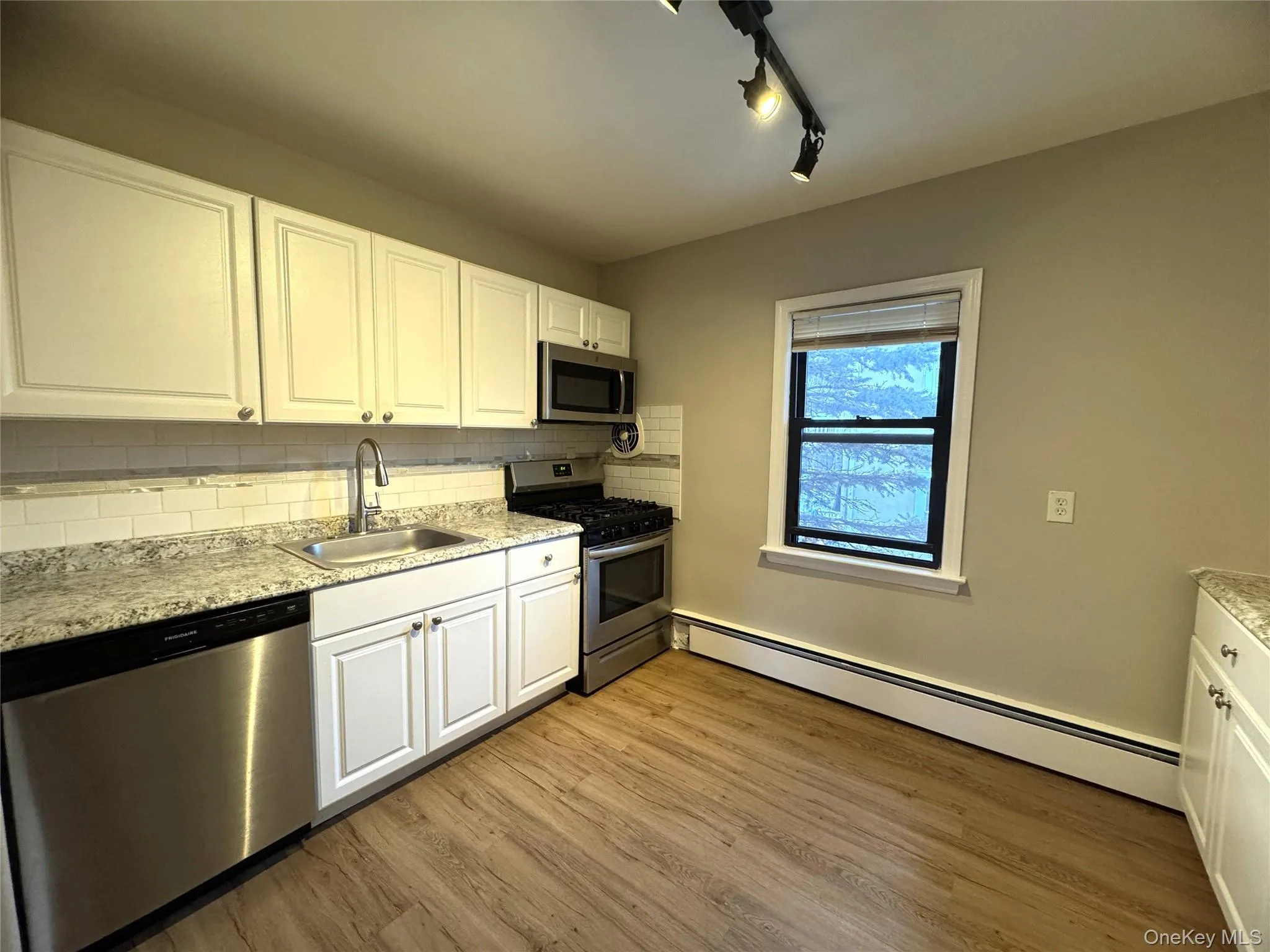 Updated Eat-In Kitchen with dishwasher and gas range Updated Eat-In Kitchen with dishwasher and gas range