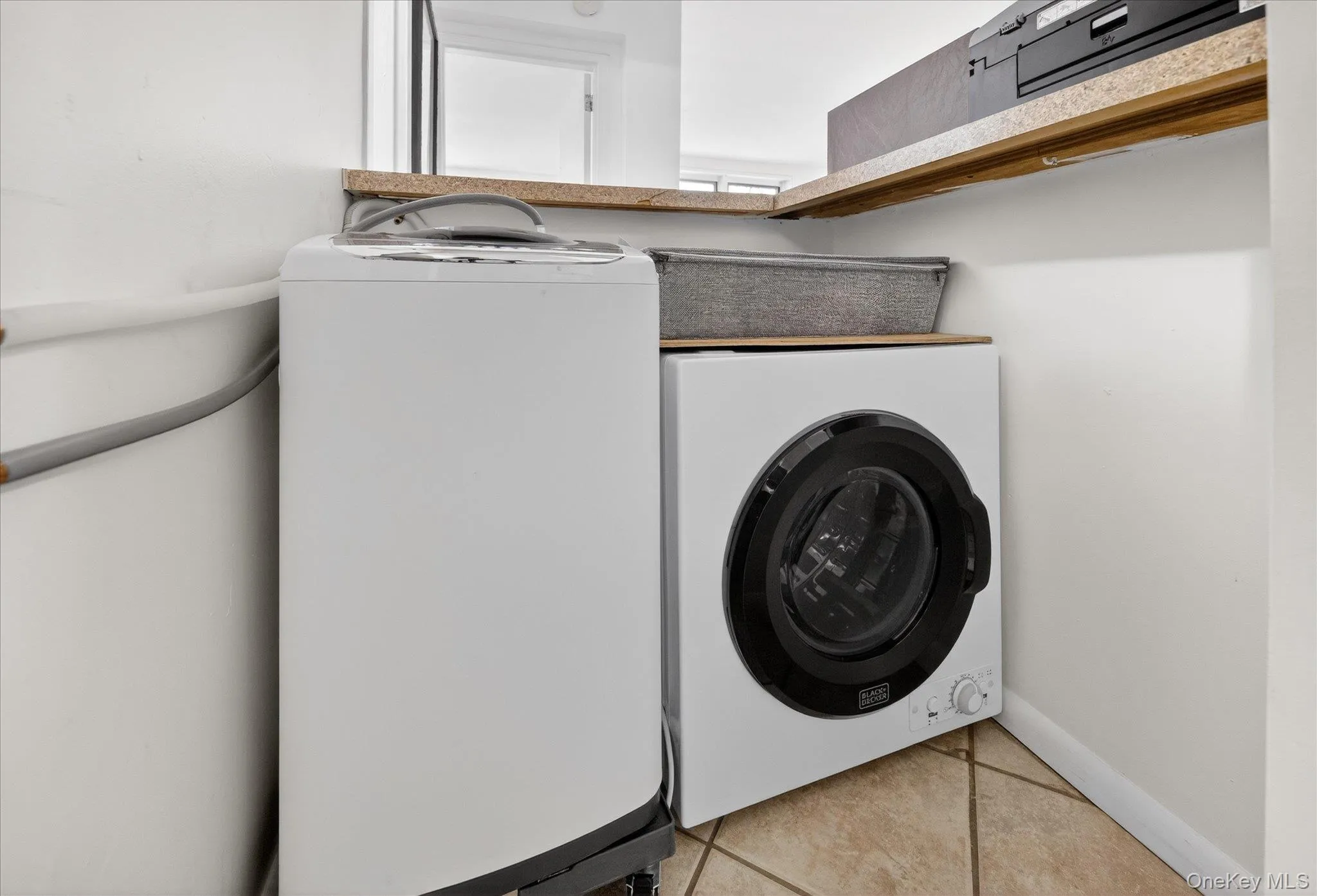 Laundry room featuring washer / clothes dryer Laundry room featuring washer / clothes dryer