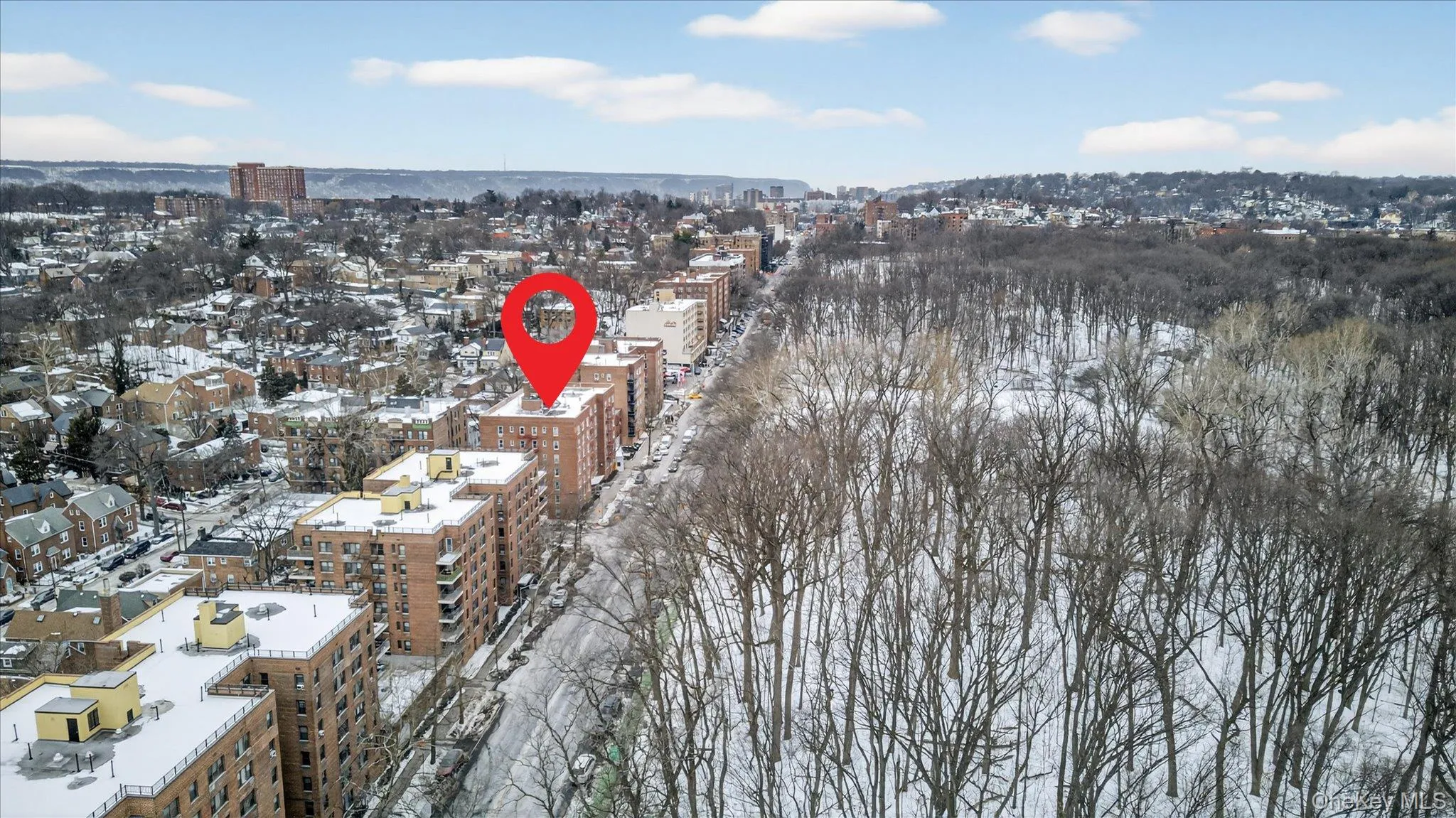 Aerial view of property's location with nearby urban area Aerial view of property's location with nearby urban area
