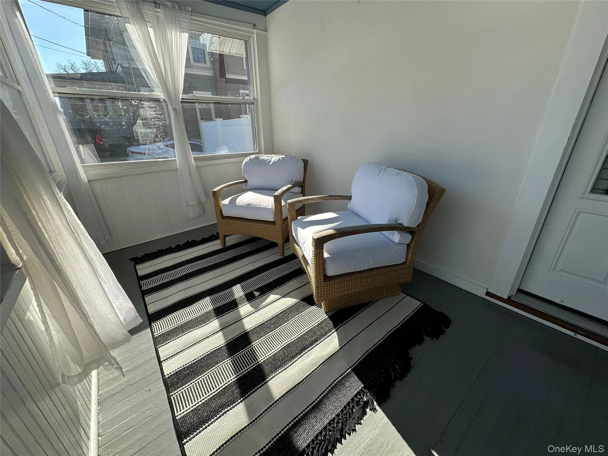 Enclosed front porch - 3 season room. Enclosed front porch - 3 season room.