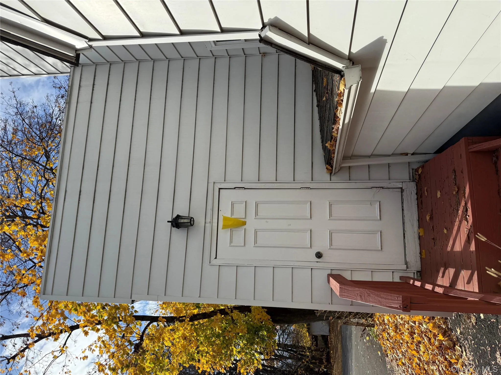 Doorway to property with a wooden deck Doorway to property with a wooden deck