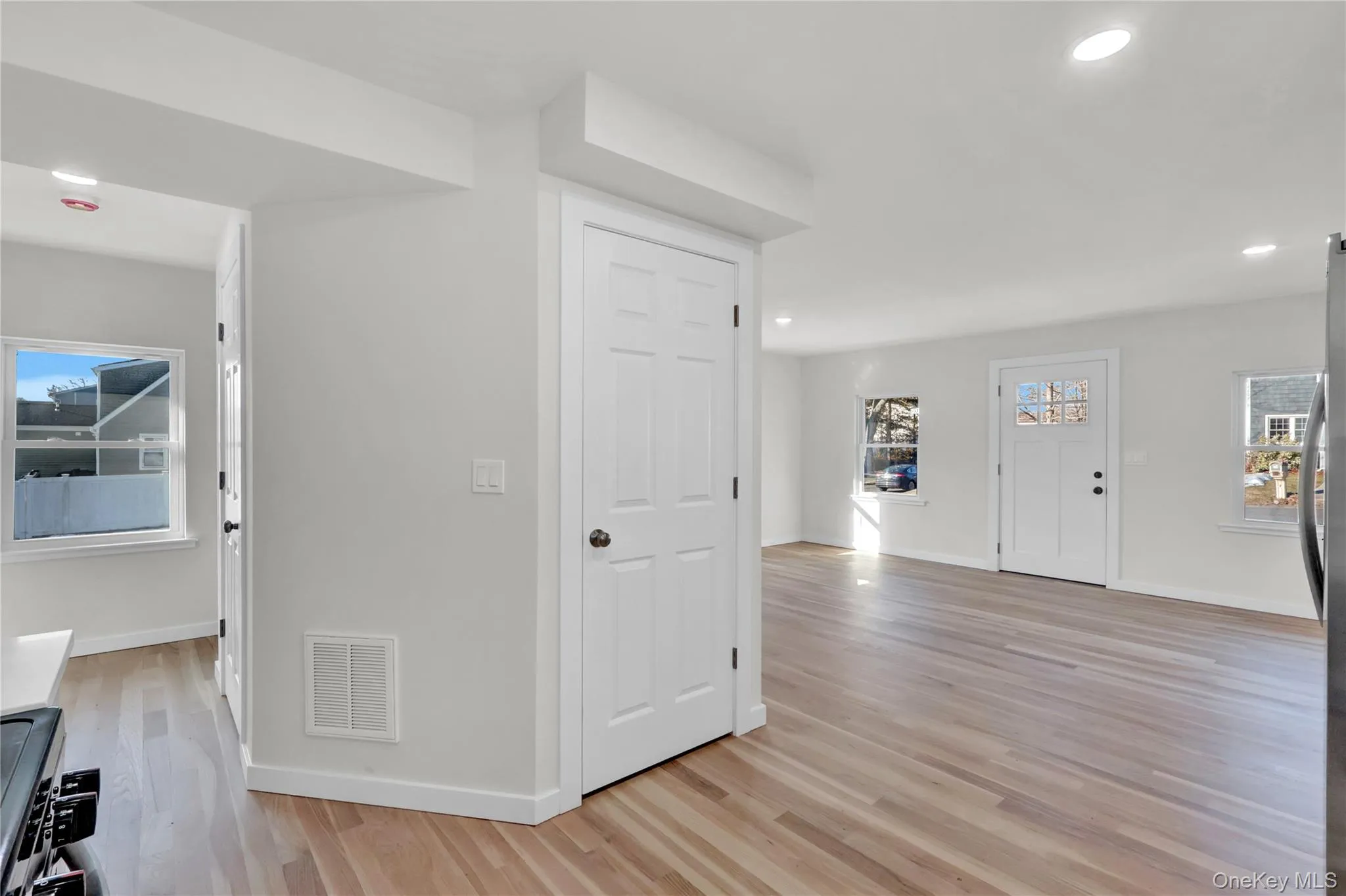 view into living room/dining area from kitchen view into living room/dining area from kitchen