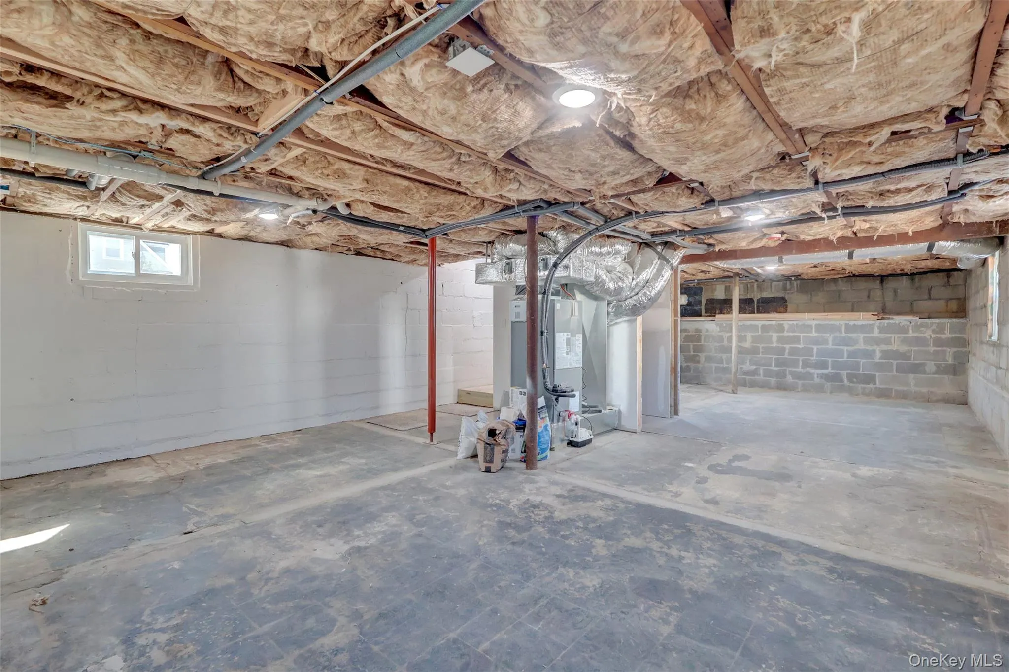 unfinished. stairs to main floor unfinished. stairs to main floor