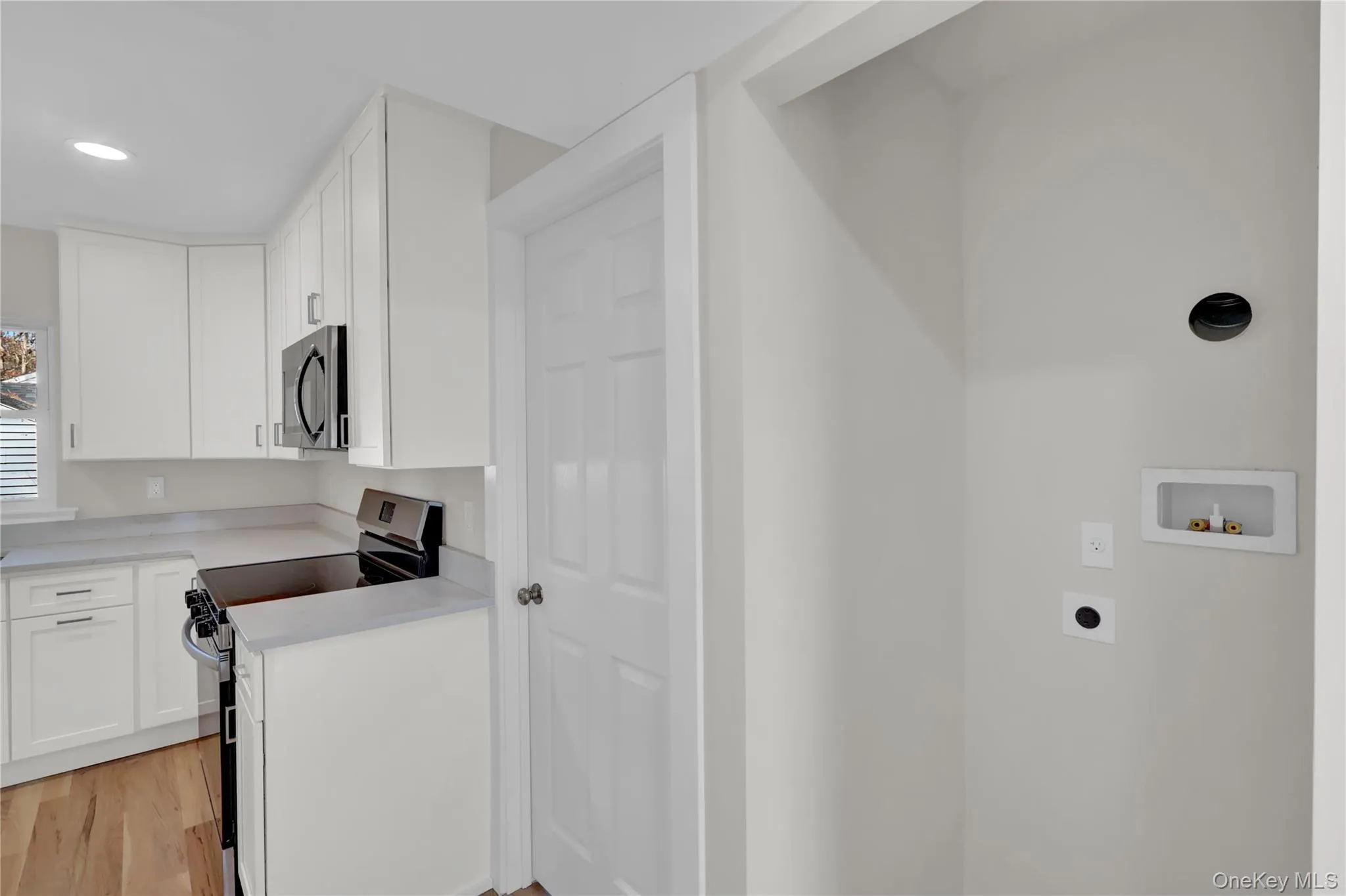 to kitchen, stackable washer/dryer hookup to kitchen, stackable washer/dryer hookup