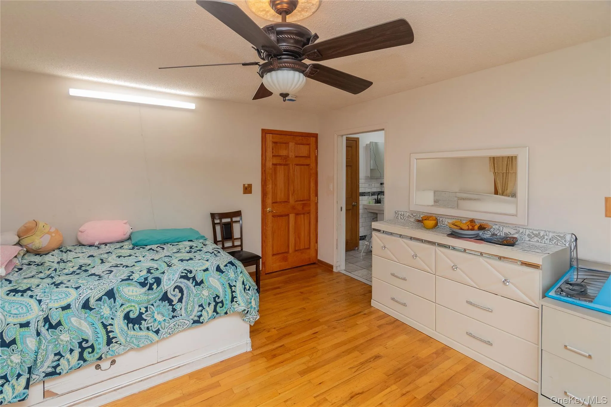 First floor bedroom with shared access of main level full bath First floor bedroom with shared access of main level full bath