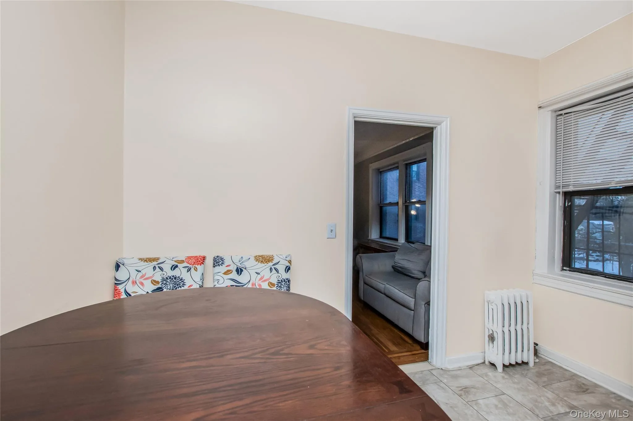 Dining space with radiator and baseboards Dining space with radiator and baseboards