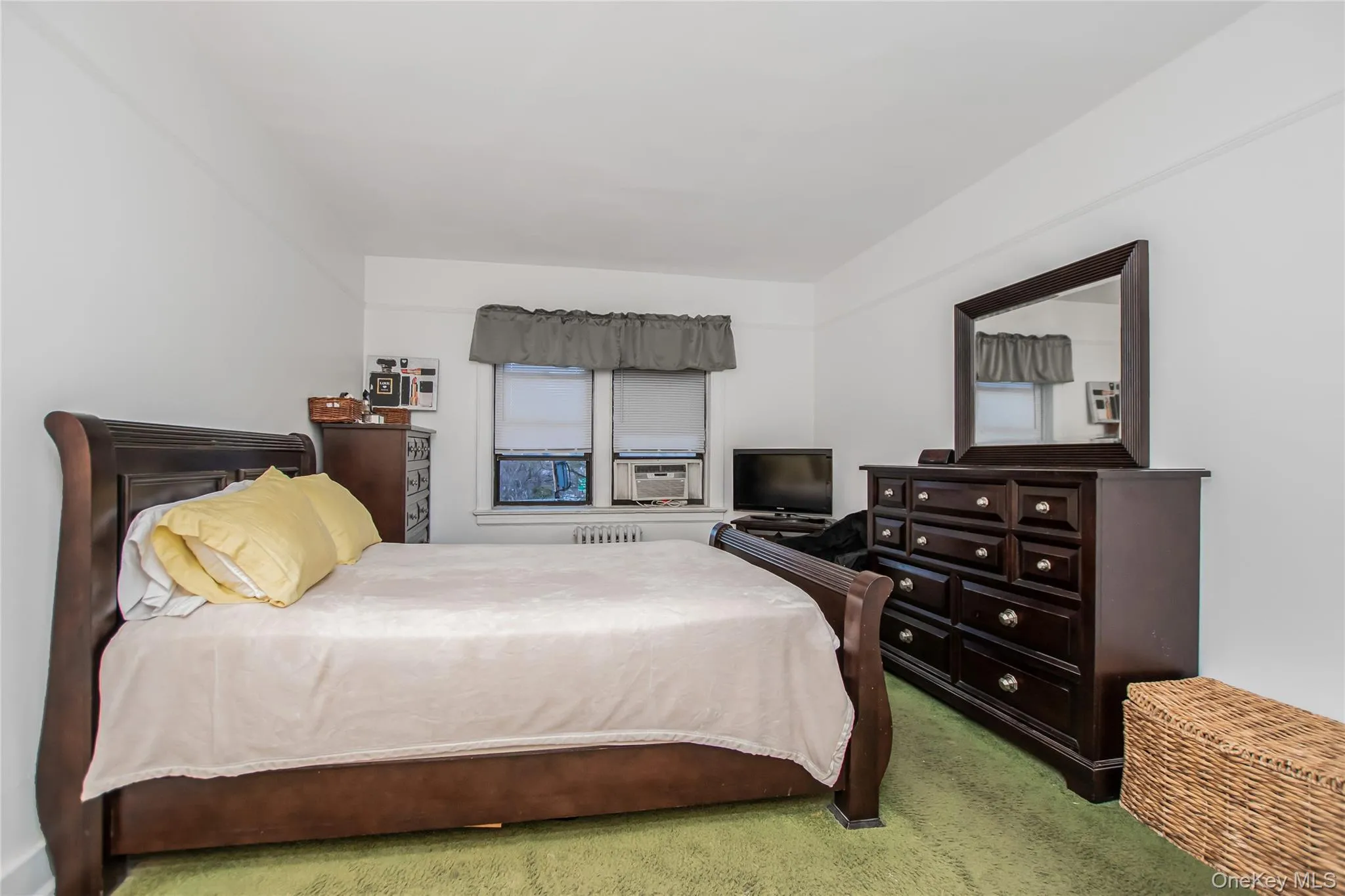 Bedroom with carpet flooring Bedroom with carpet flooring