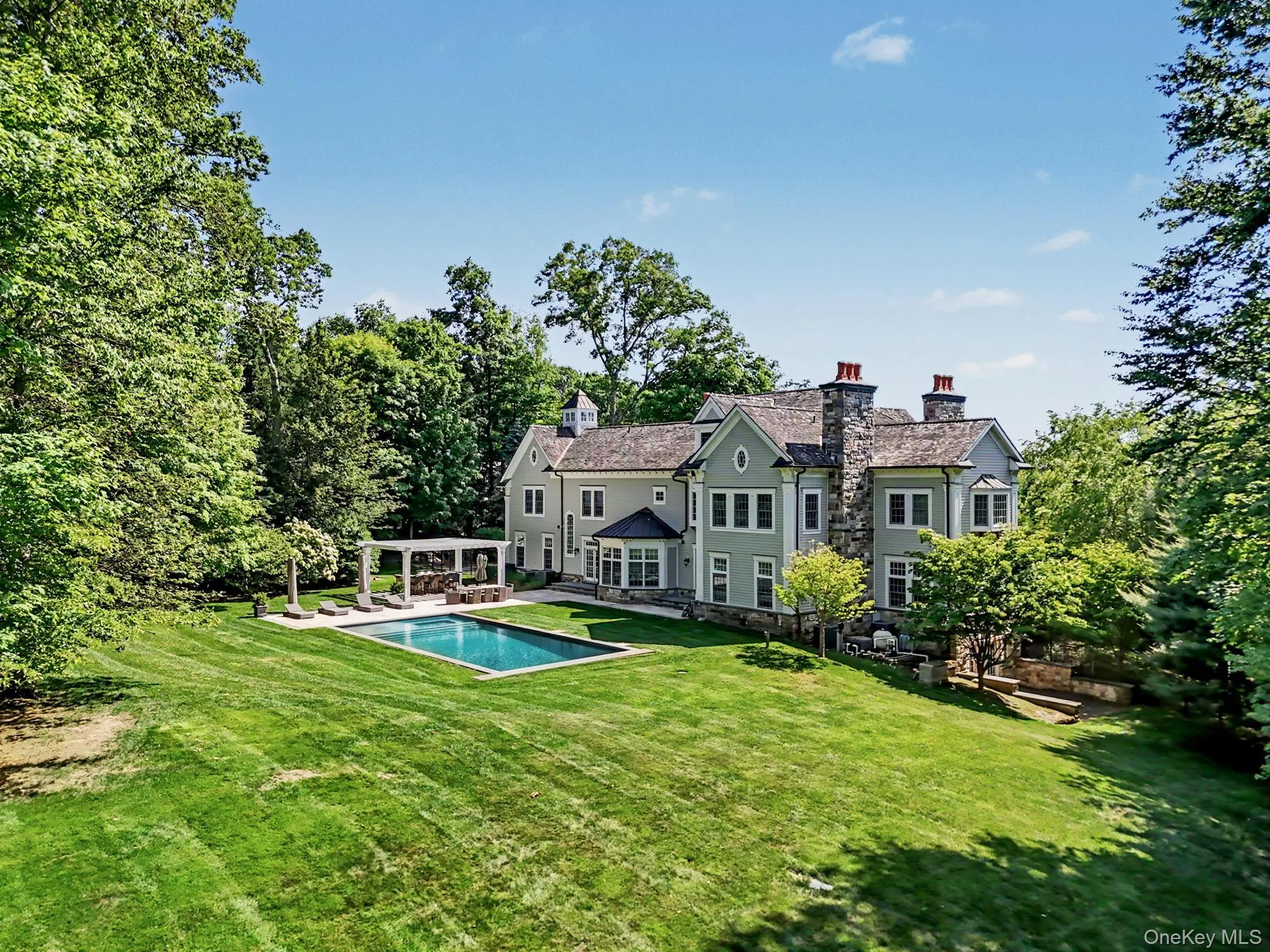 Set on 2.2 private, tranquil acres designed for exceptional entertaining, featuring a pool, spa, custom-built outdoor kitchen, and a beautiful pergola. Set on 2.2 private, tranquil acres designed for exceptional entertaining, featuring a pool, spa, custom-built outdoor kitchen, and a beautiful pergola.