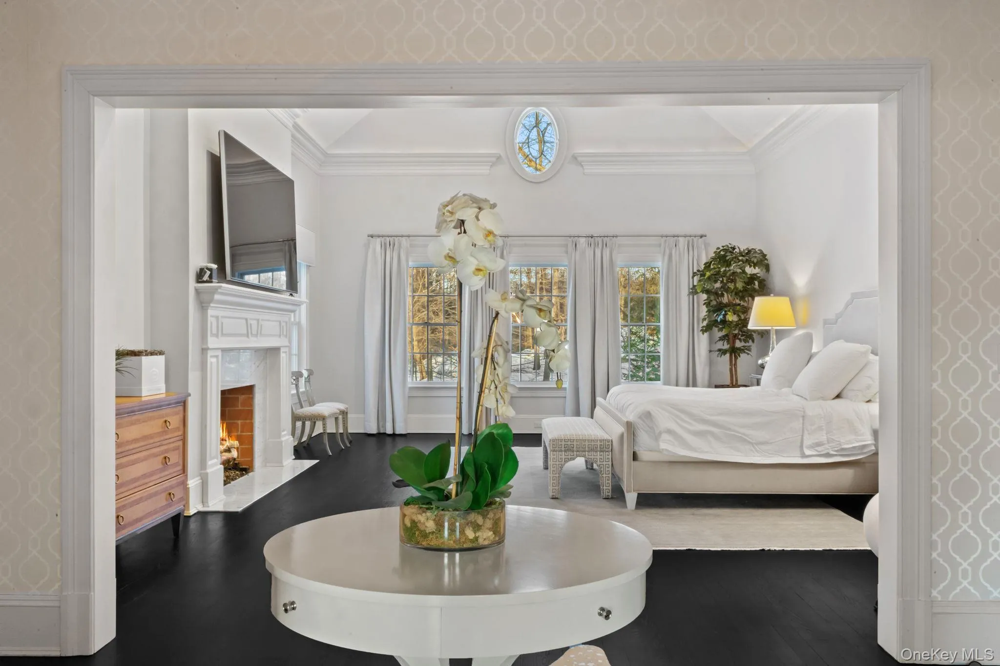 If you’re seeking a space that’s anything but ordinary—luscious, stylish, grand, and comfortable all at once, you’ll find it here. The owner’s bedroom suite opens to a vestibule featuring an architectural ceiling and elegant cove lighting. If you’re seeking a space that’s anything but ordinary—luscious, stylish, grand, and comfortable all at once, you’ll find it here. The owner’s bedroom suite opens to a vestibule featuring an architectural ceiling and elegant cove lighting.