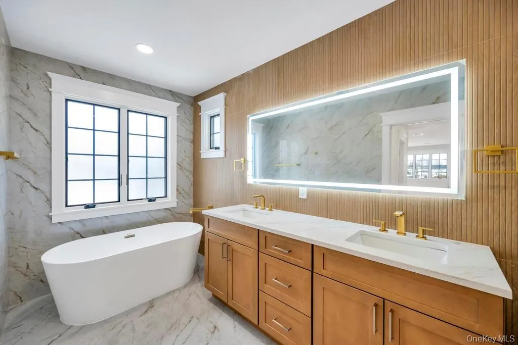 Primary spa bath with soaking tub and standing shower Primary spa bath with soaking tub and standing shower