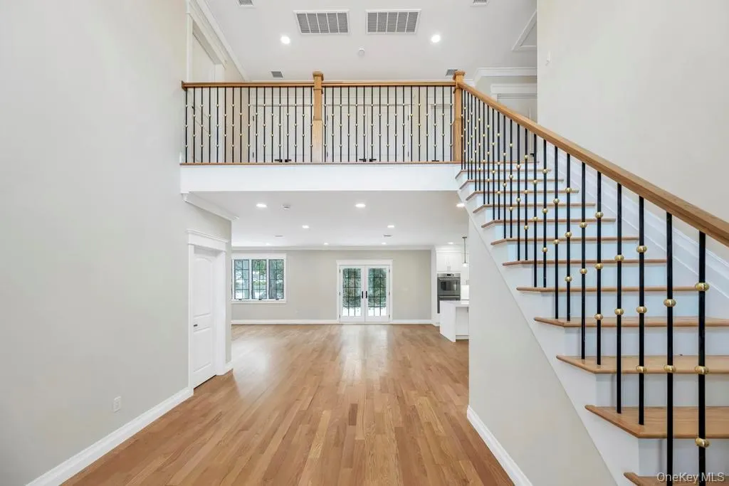 3600 sq ft double height entry foyer, Left is 1st en suite bedroom 3600 sq ft double height entry foyer, Left is 1st en suite bedroom
