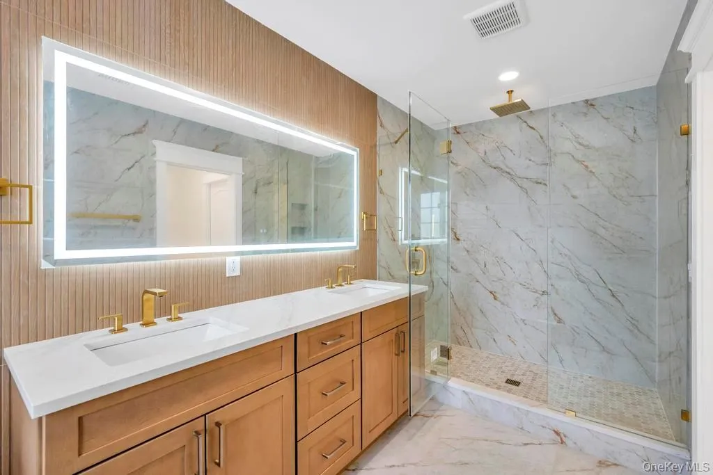 Primary spa bath with soaking tub and standing shower Primary spa bath with soaking tub and standing shower