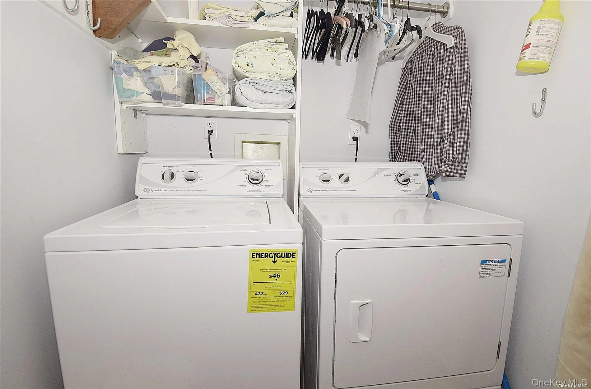 Laundry room featuring washing machine and dryer Laundry room featuring washing machine and dryer