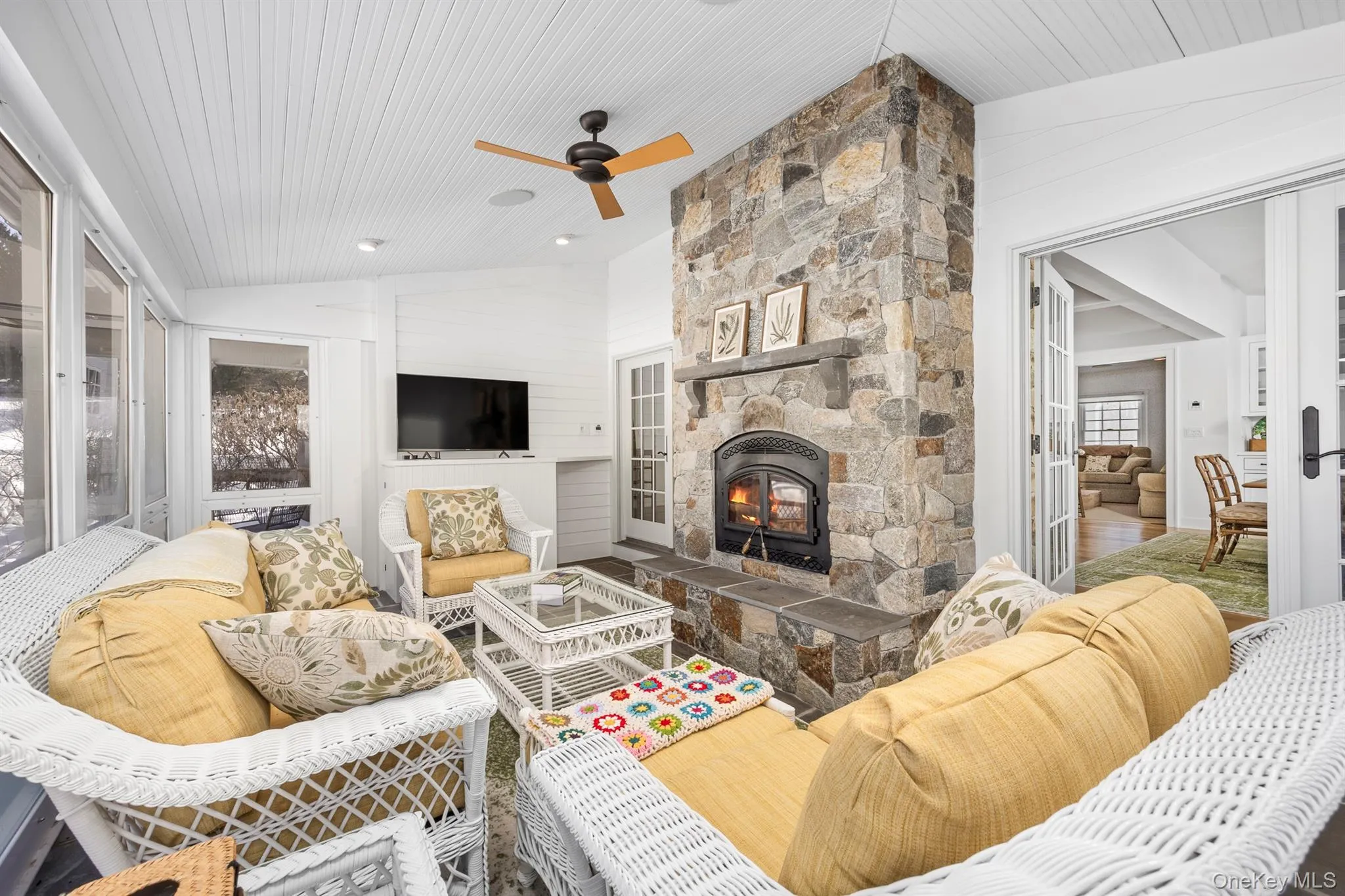 Three season room has AC and fireplace.Views of the meadow. Three season room has AC and fireplace.Views of the meadow.