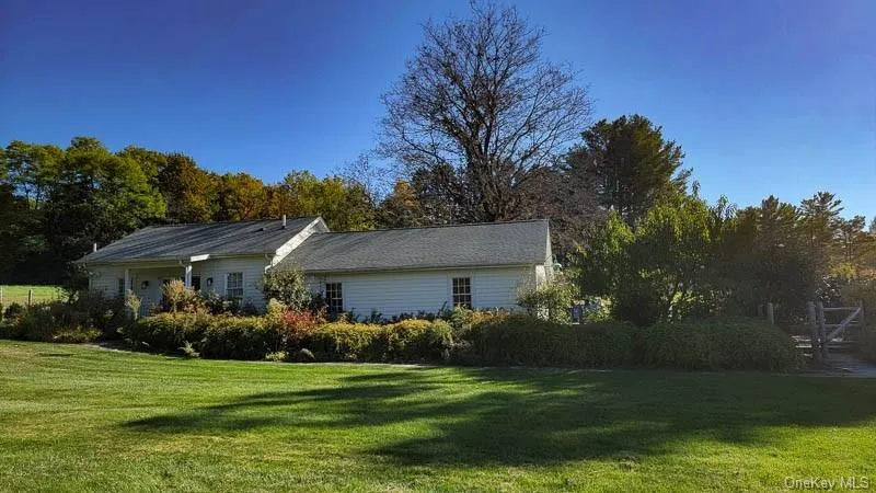 Studio and two car garage are a short walk from the house. Studio and two car garage are a short walk from the house.