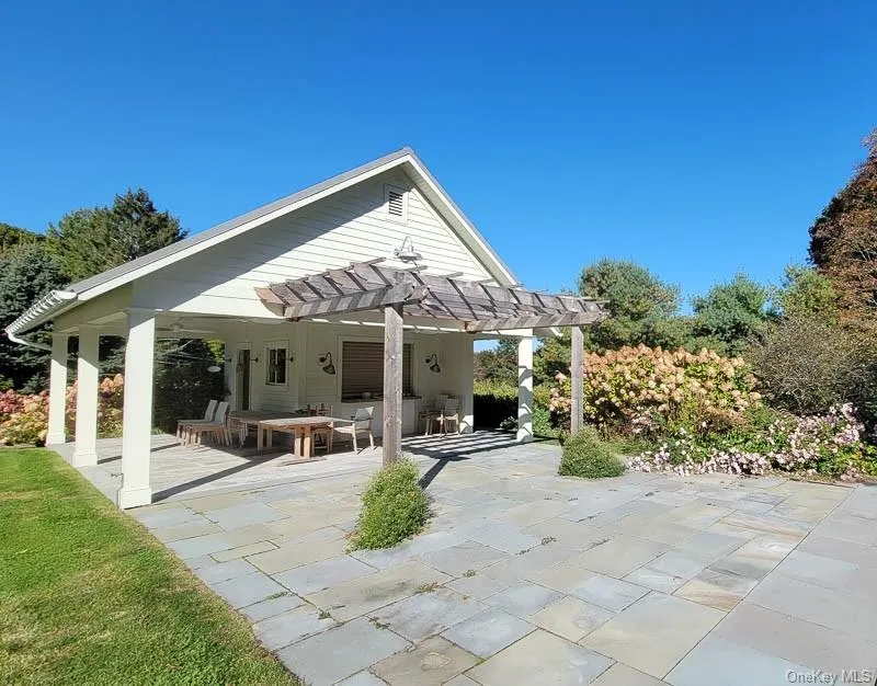 Pool house has a half bath, outdoor shower and kitchenette Pool house has a half bath, outdoor shower and kitchenette
