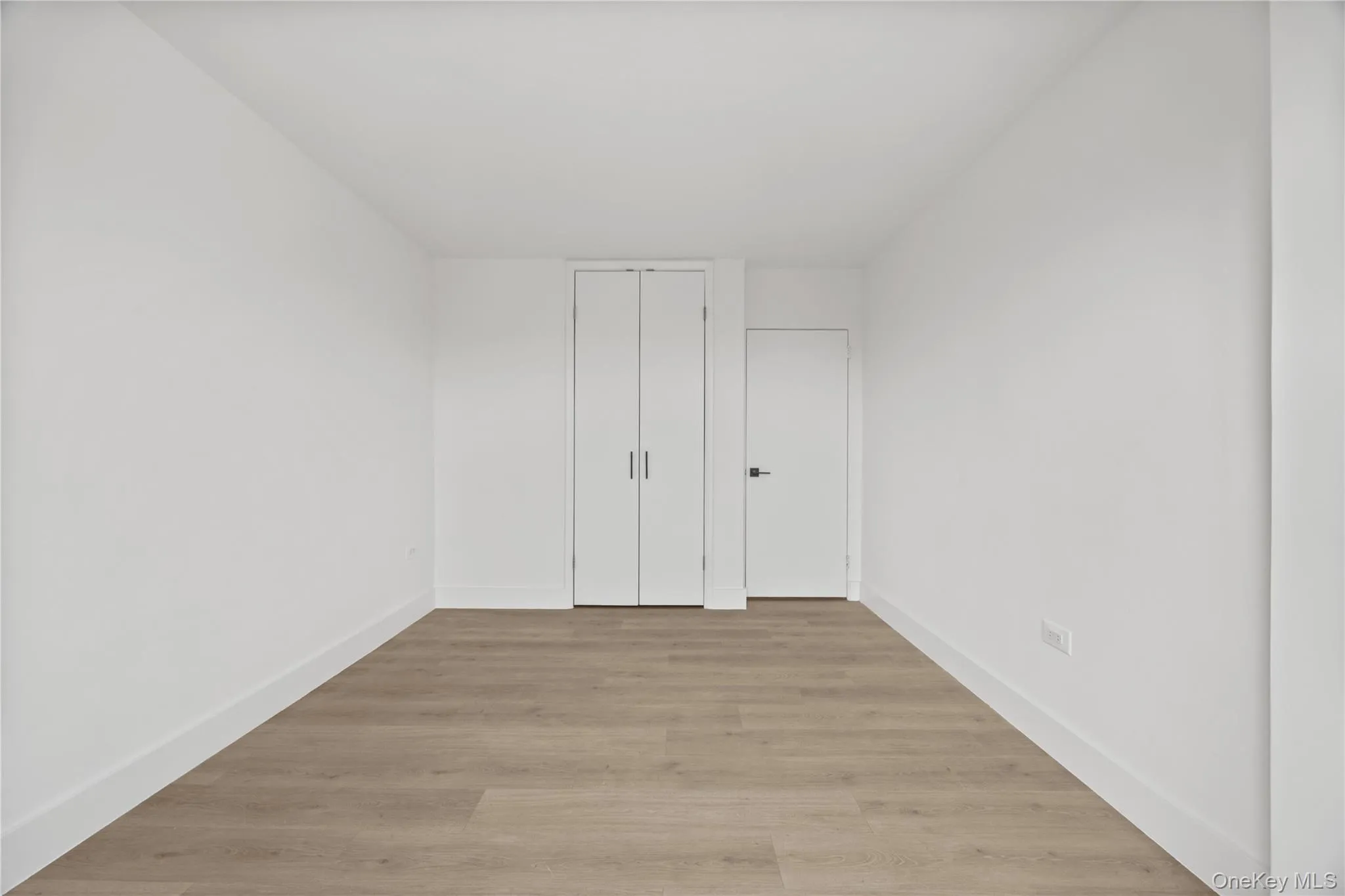 Bedroom #2 with closet and vinyl plank floors Bedroom #2 with closet and vinyl plank floors