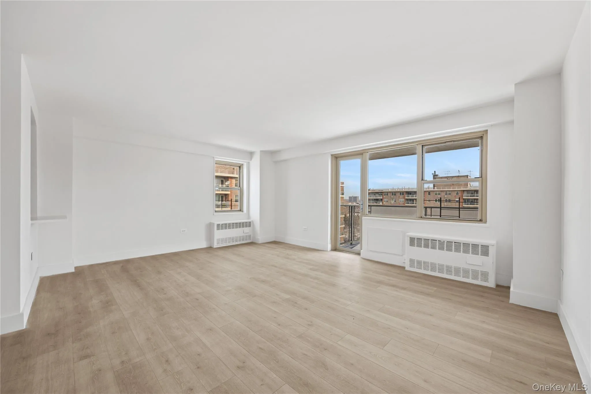 Spacious living room with plenty of windows and natural light Spacious living room with plenty of windows and natural light
