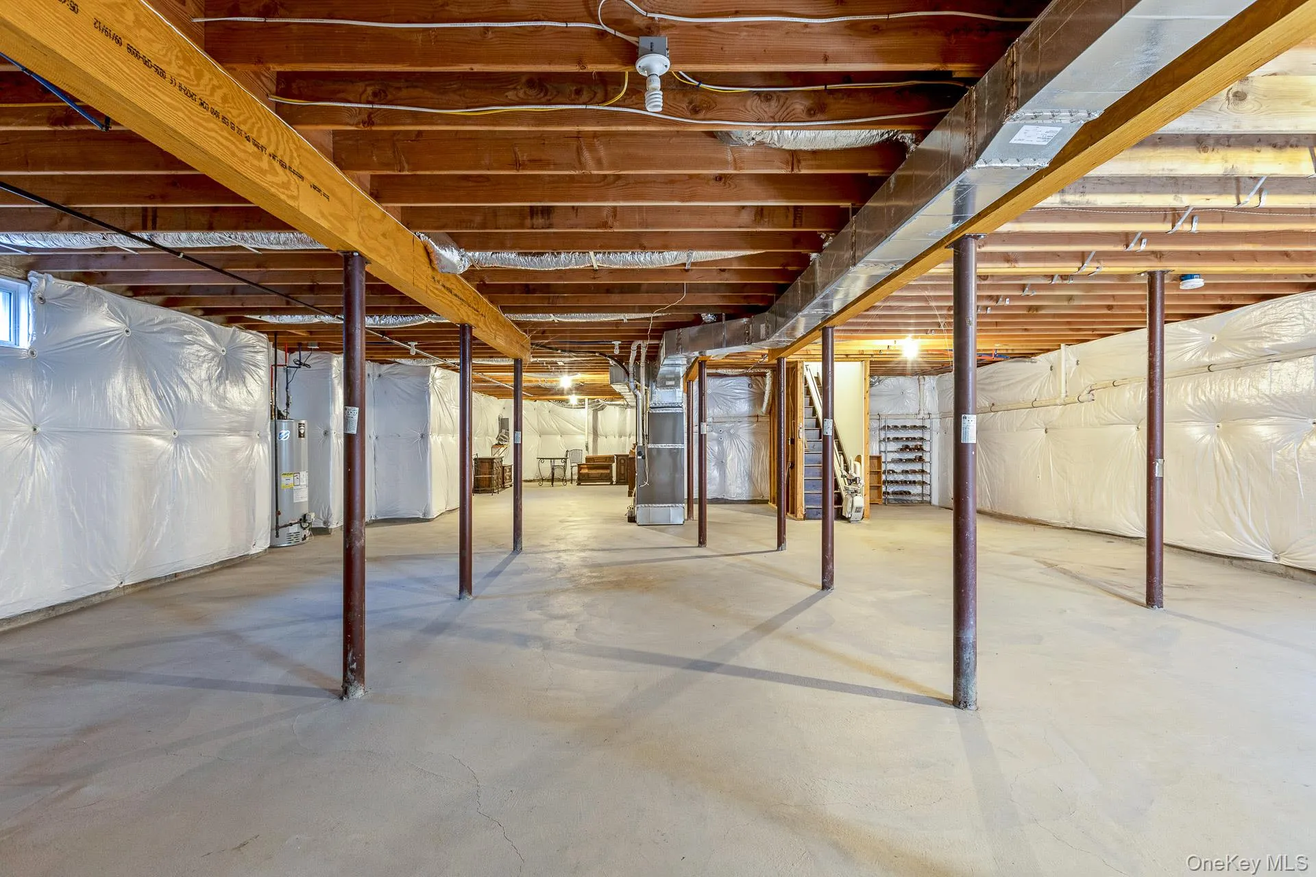 Huge Unfinished basement with high ceilings offering loads of potential for finishing and/or storage Huge Unfinished basement with high ceilings offering loads of potential for finishing and/or storage