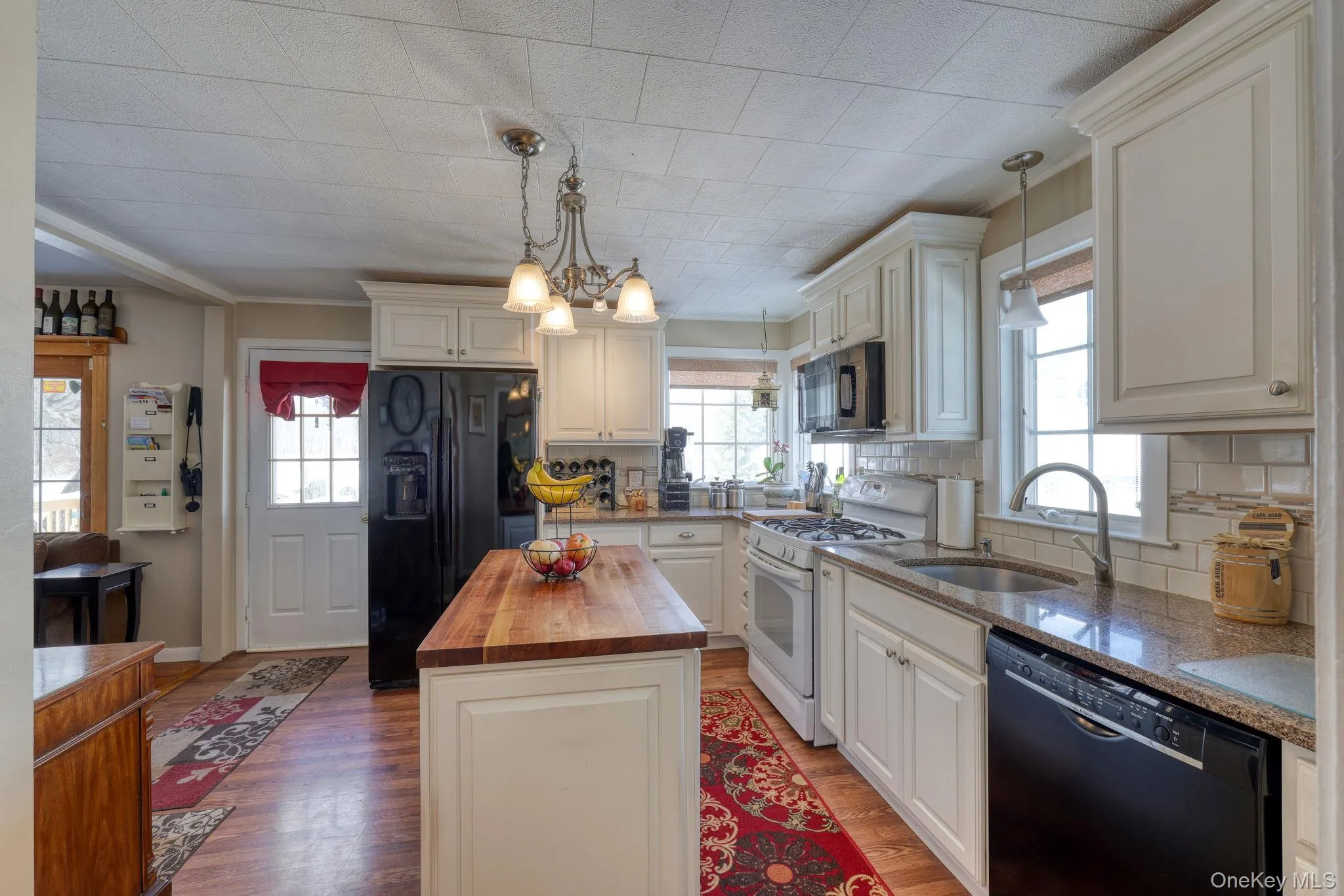 Updated kitchen with island and soft close pullout drawers. Updated kitchen with island and soft close pullout drawers.