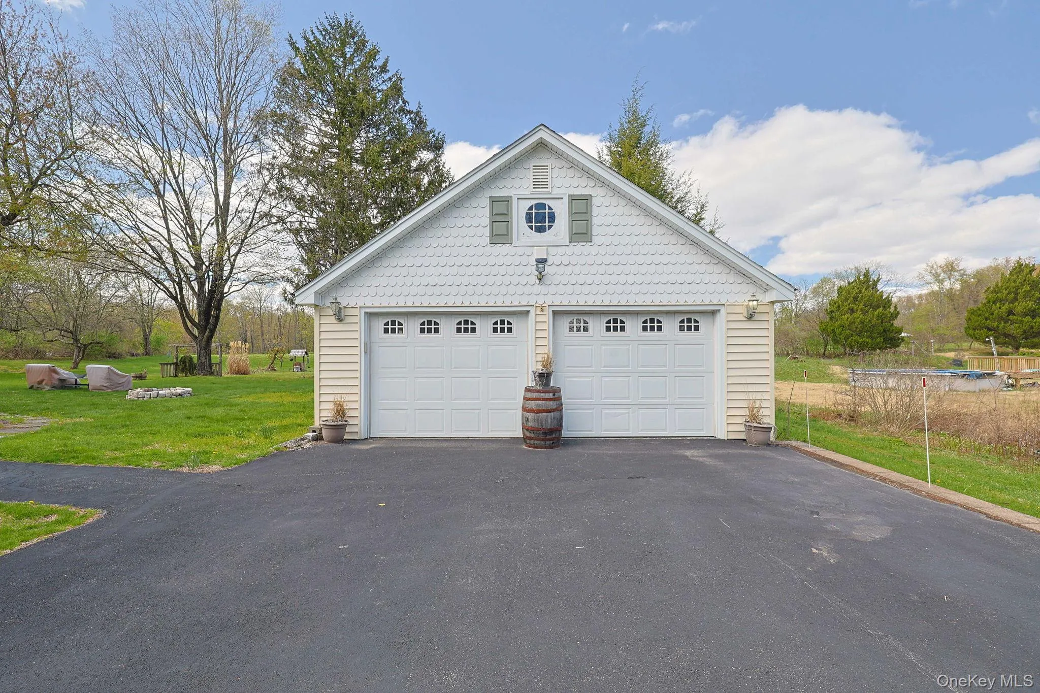Garage with full walk up loft for storage or possible finished space. Garage with full walk up loft for storage or possible finished space.