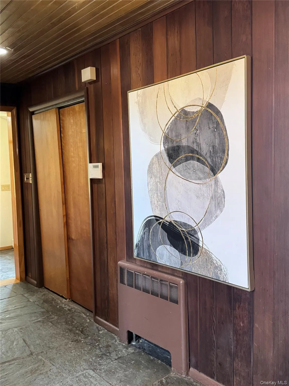 Guest Coat Closets and Large Walls of Art Work. Guest Coat Closets and Large Walls of Art Work.