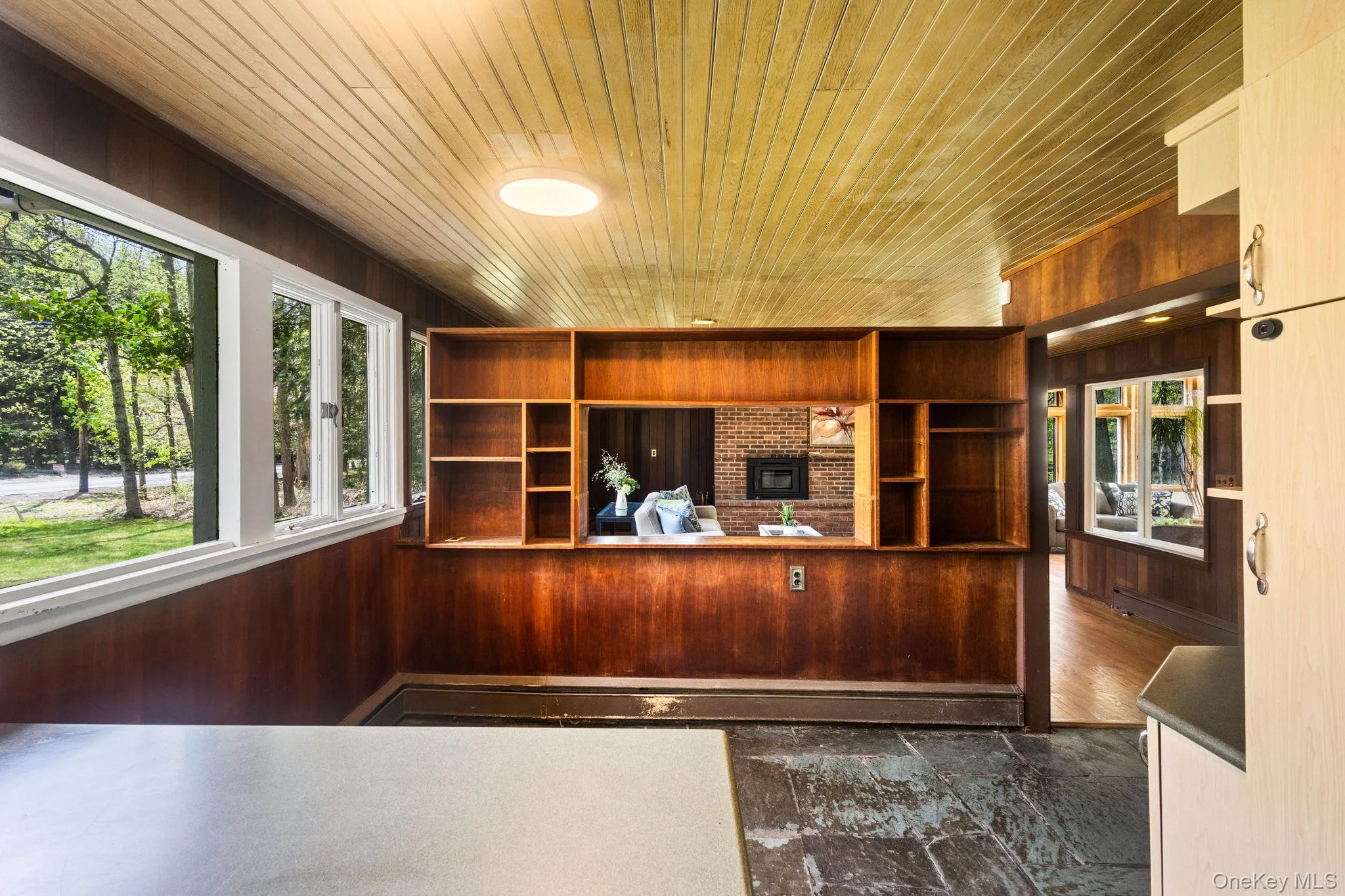 Breakfast Nook andEntertaining Areaw/ Pass Throughto Living Room. Breakfast Nook andEntertaining Areaw/ Pass Throughto Living Room.