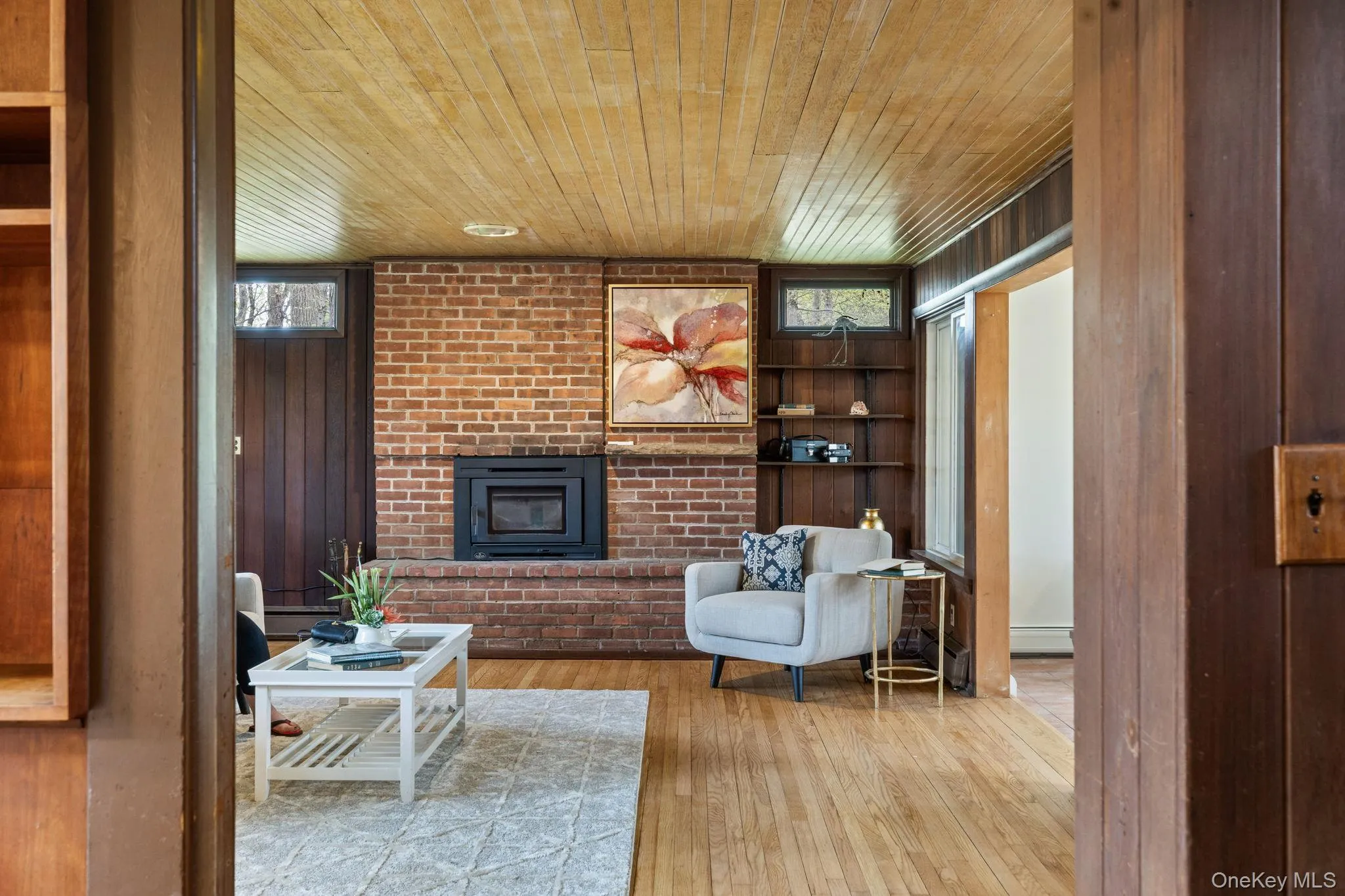 Double Entry leads from Main Hall into Living Room Show-Casing Fireplace. Double Entry leads from Main Hall into Living Room Show-Casing Fireplace.