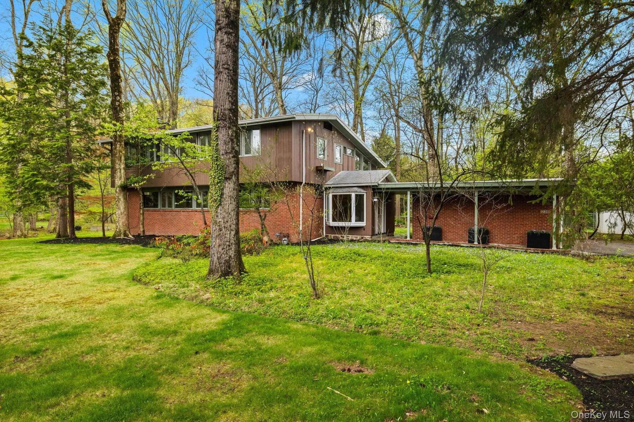 Showing Full View of House with Front Lawn. Showing Full View of House with Front Lawn.